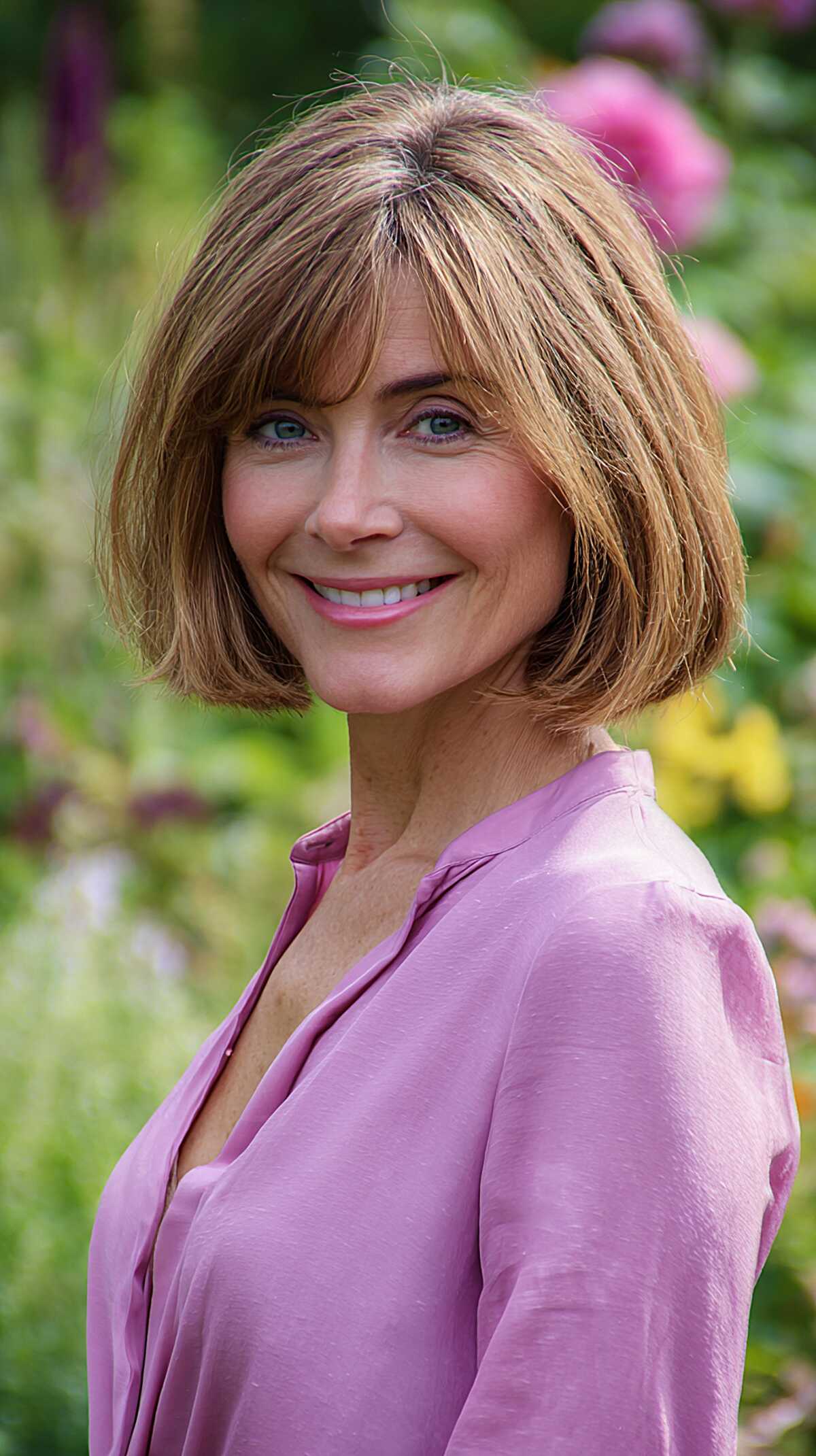 Classic honey blonde bob with soft inward-turning ends