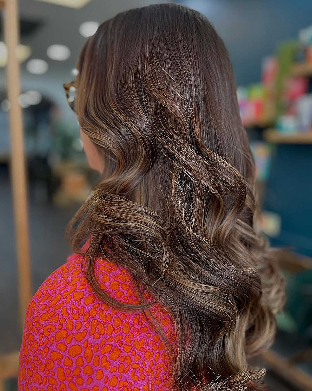 Dark espresso brunette with subtle toffee balayage waves