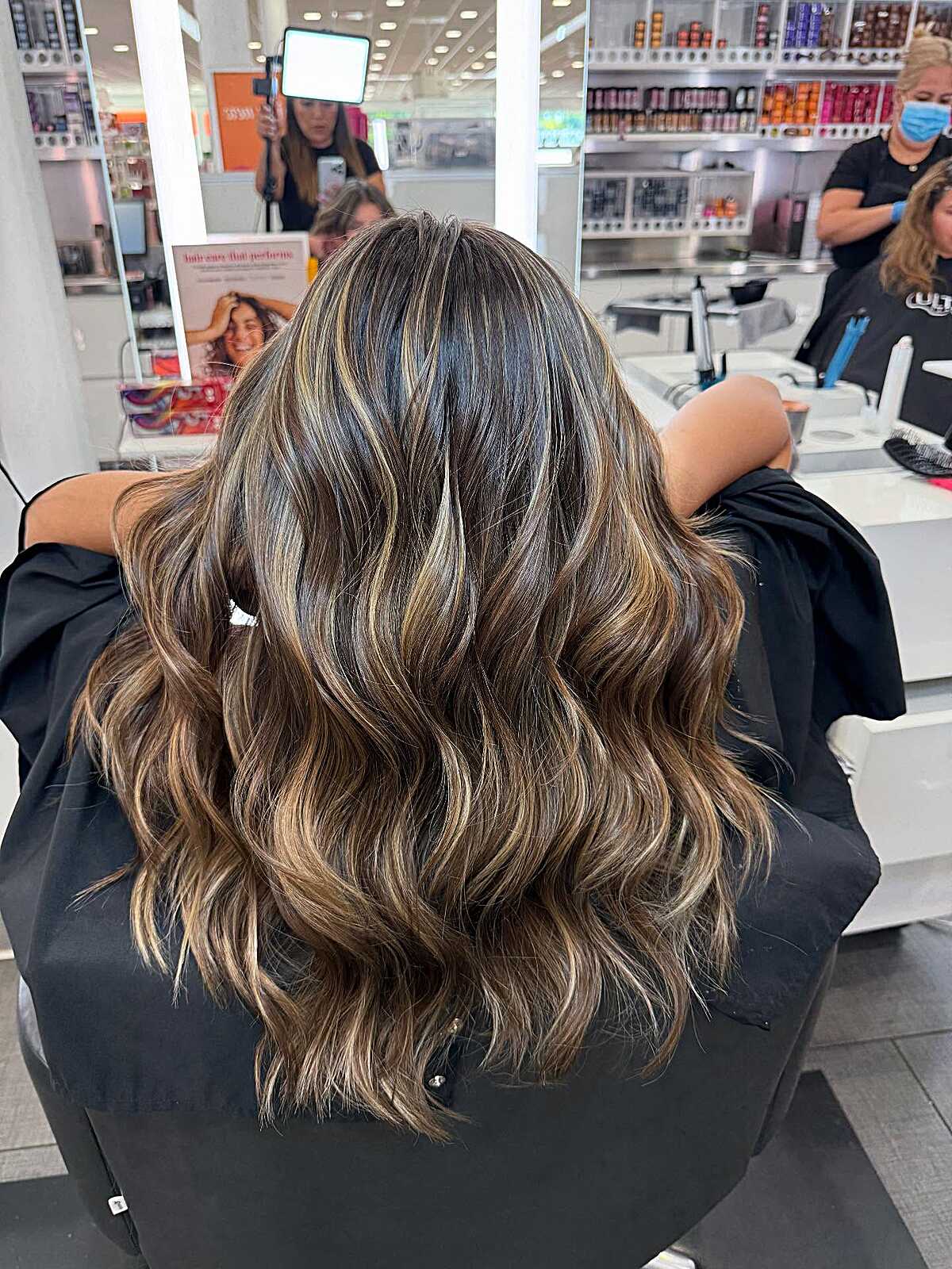 Dark brunette with bold sandy blonde balayage highlights