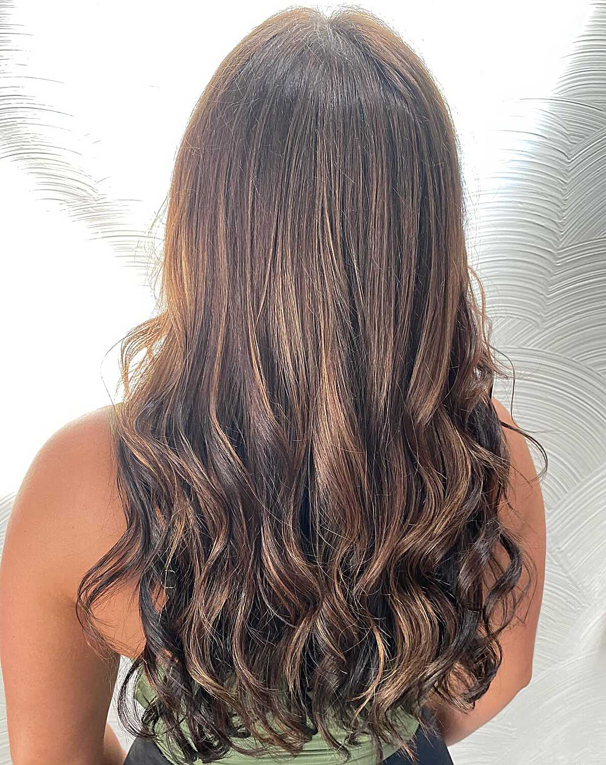 Long dark brunette with subtle caramel balayage at ends