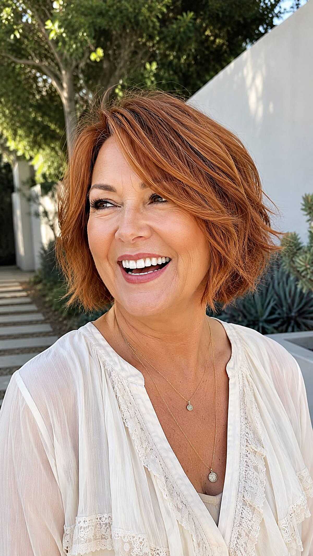 Tousled chin-length bob in vibrant living copper
