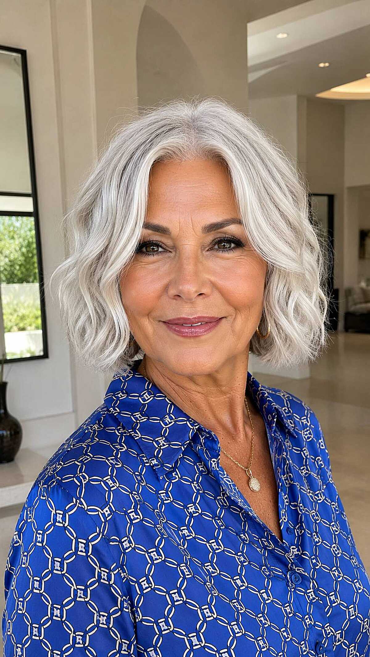 Wavy silver white chin-length bob with volume