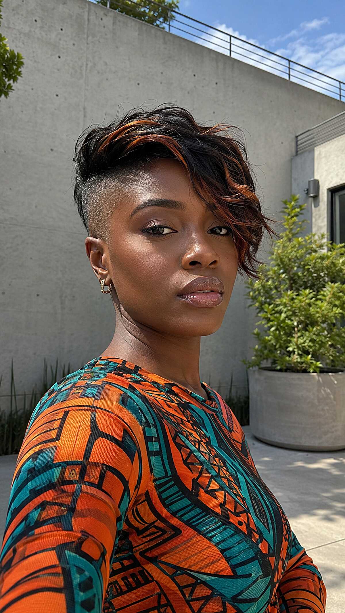 Copper-Streaked Undercut Pixie with Loose Wave Top