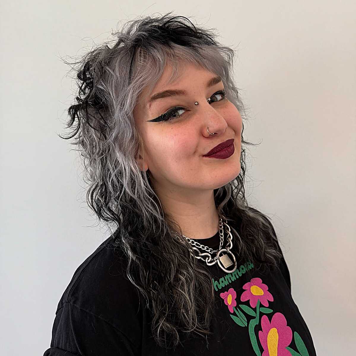 Curly silver and black shag with wispy micro bangs