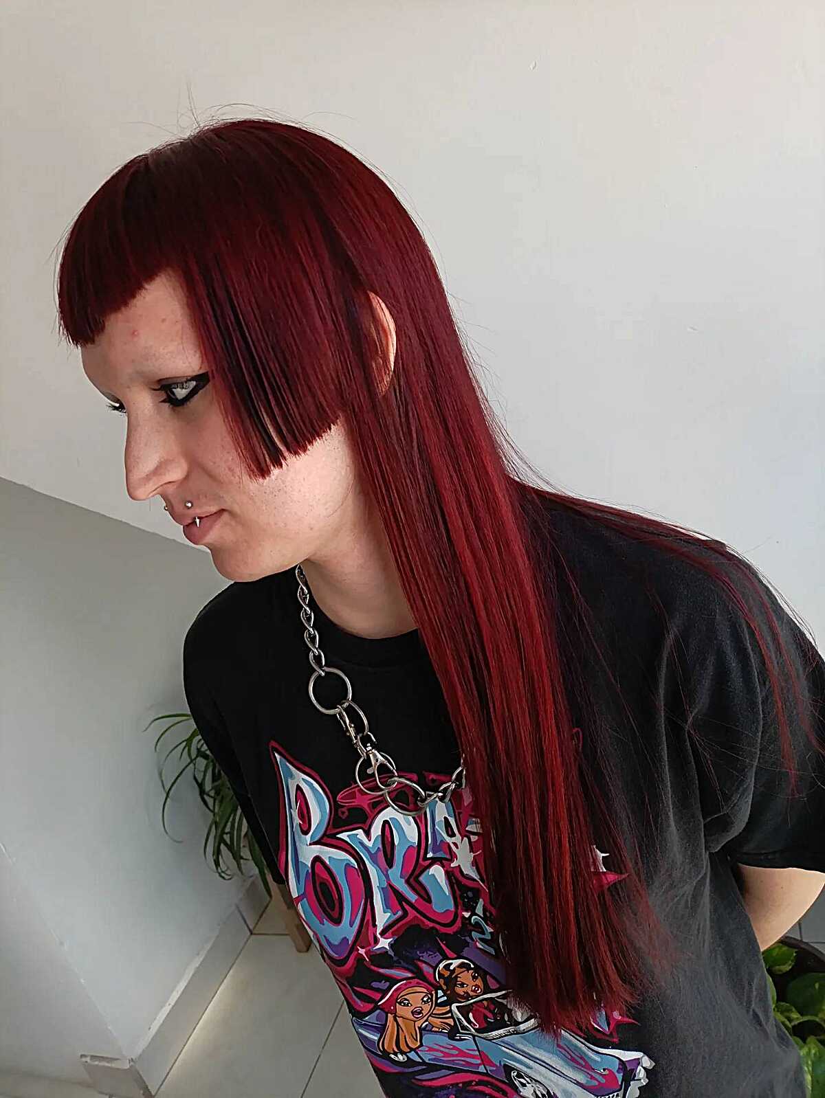 Long deep crimson red hair with blunt micro bangs