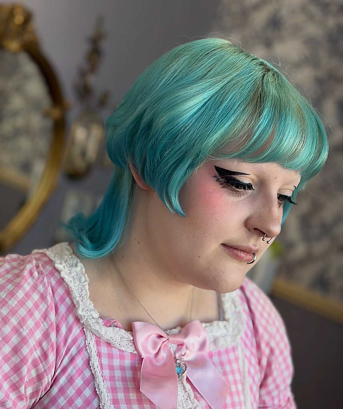 Seafoam green bob with rounded short bangs