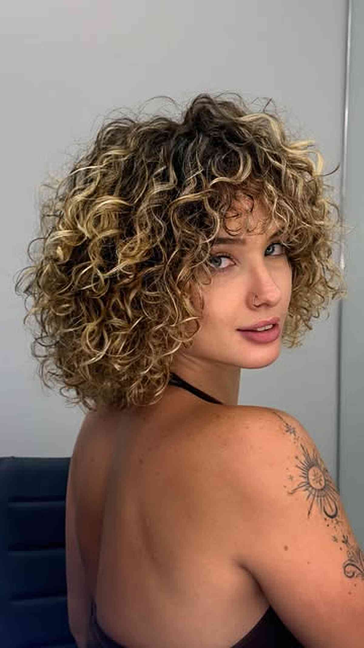 Vibrant Layered Curly Bob with Natural Bounce