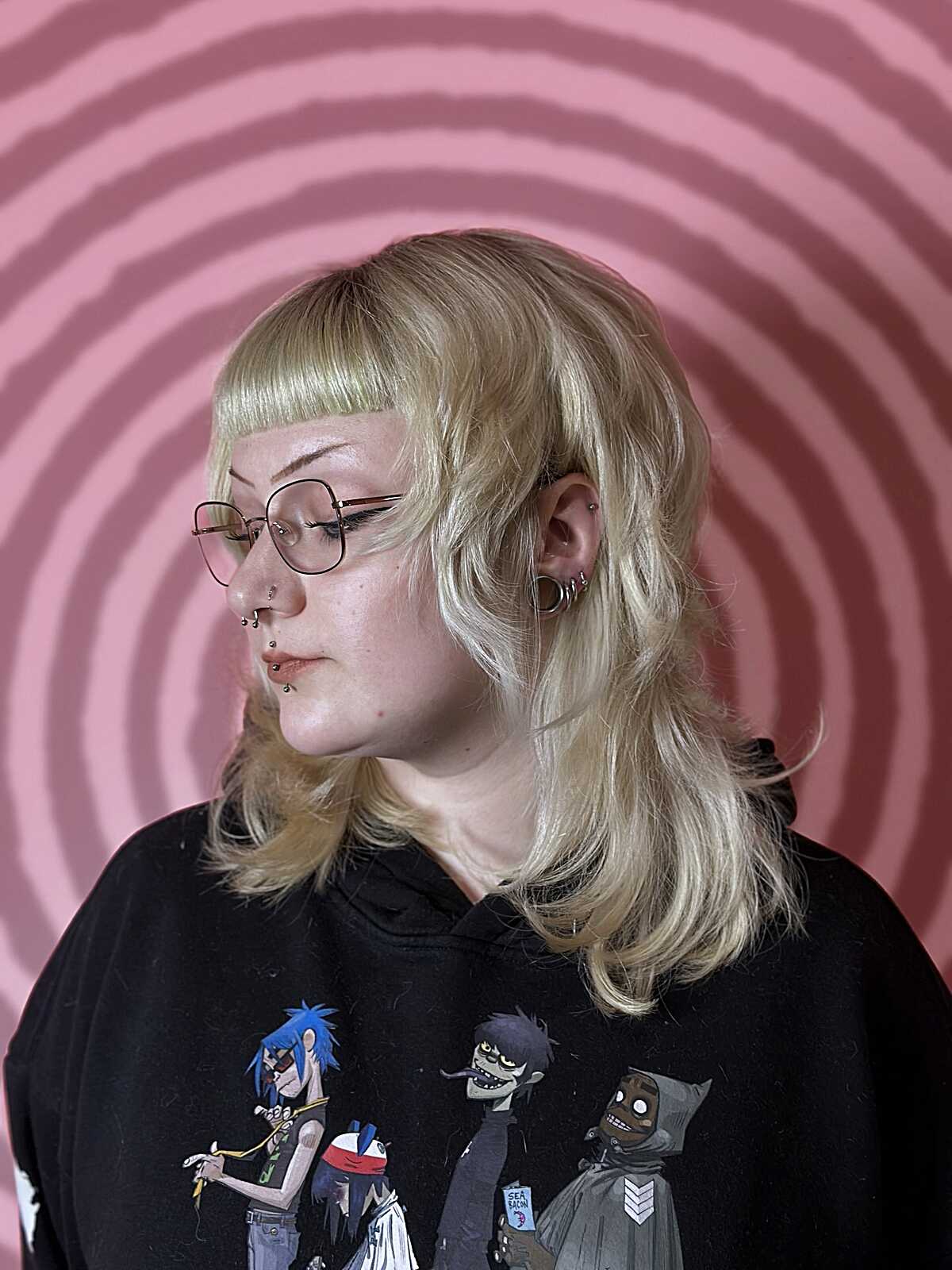 Warm blonde shag with straight cropped micro bangs