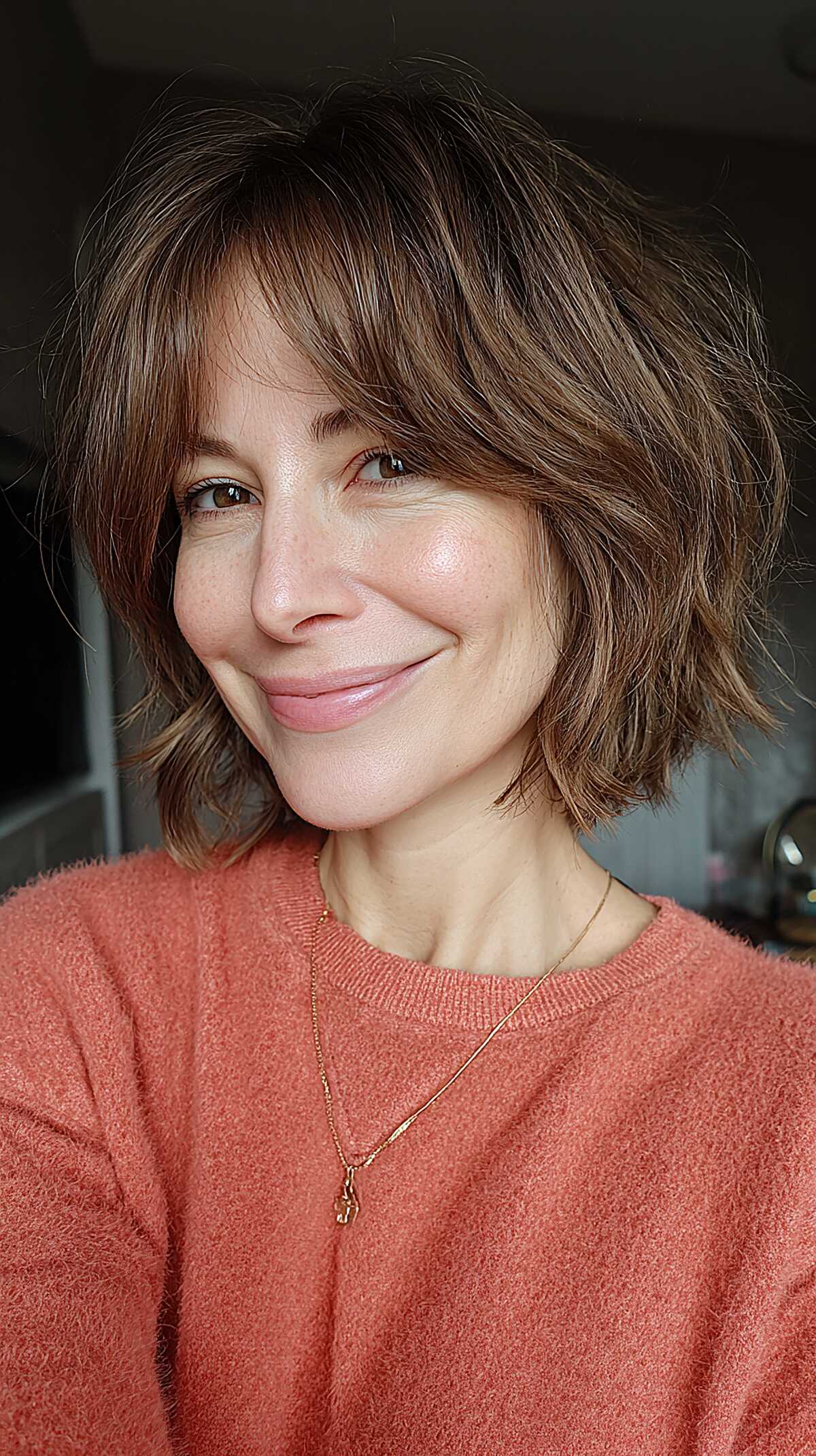 Warm Brunette Jaw-Length Shag with Soft Swept Bangs