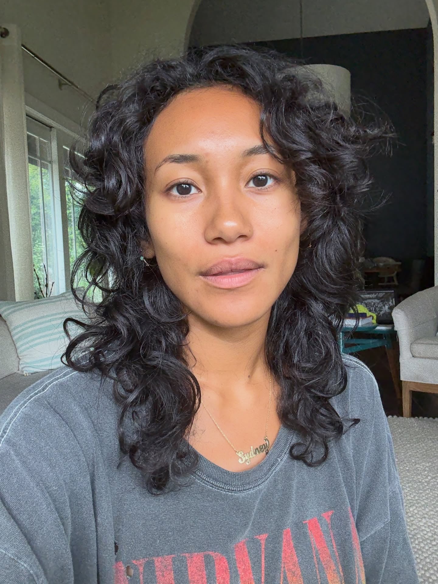 Black Collarbone Curly Wolf with Loose Face-Framing Pieces