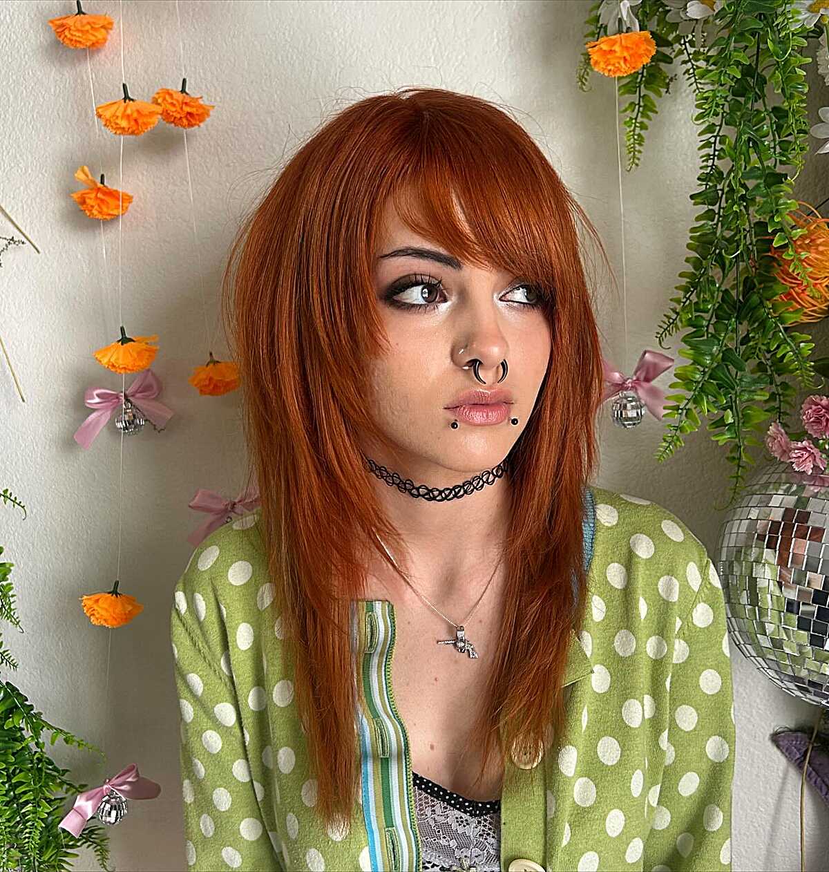 Medium-length copper red shag with deep side-swept bangs