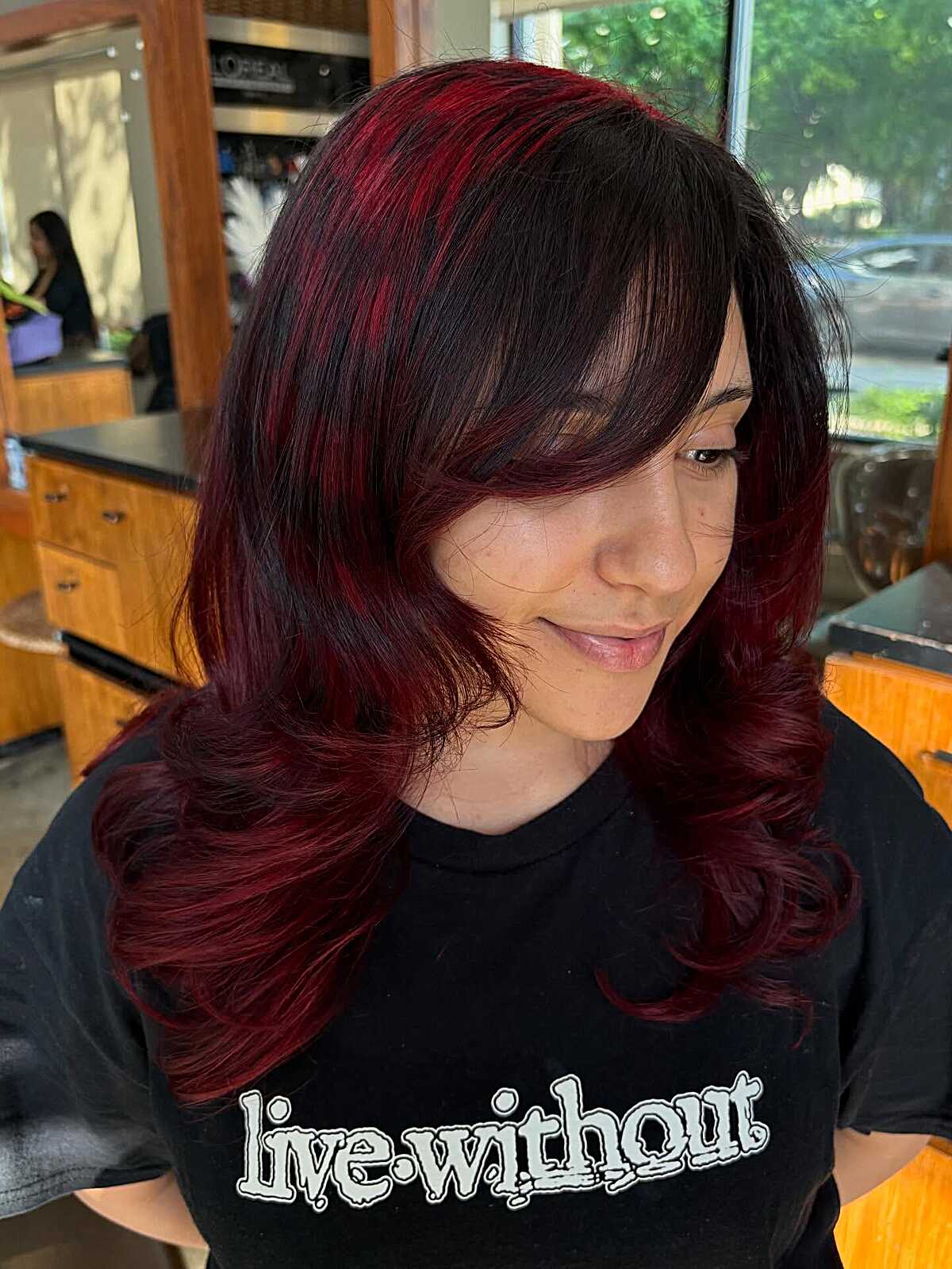 Dark cherry red with bouncy curtain layers and side bang