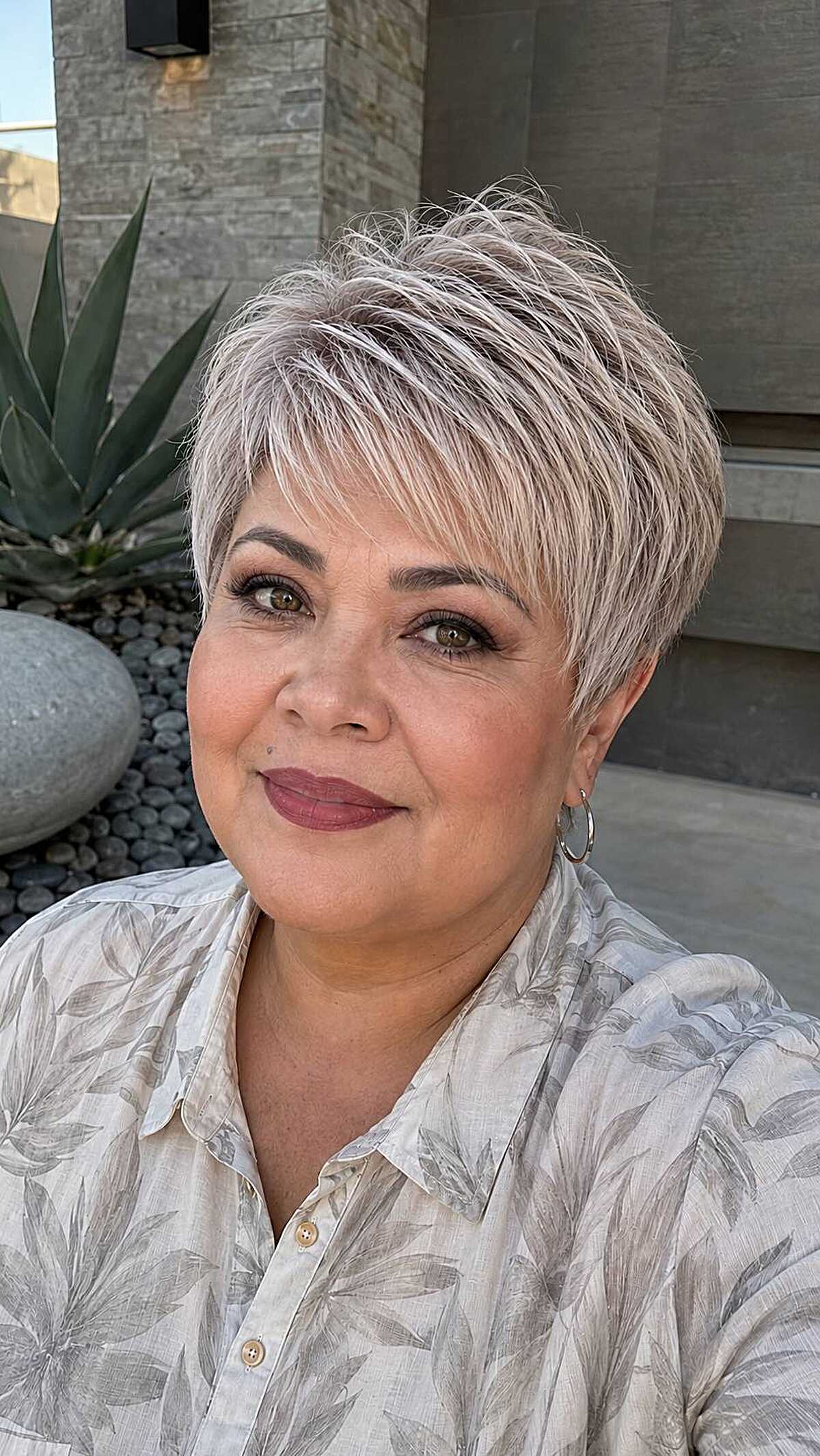 Icy platinum close-cropped pixie with textured top