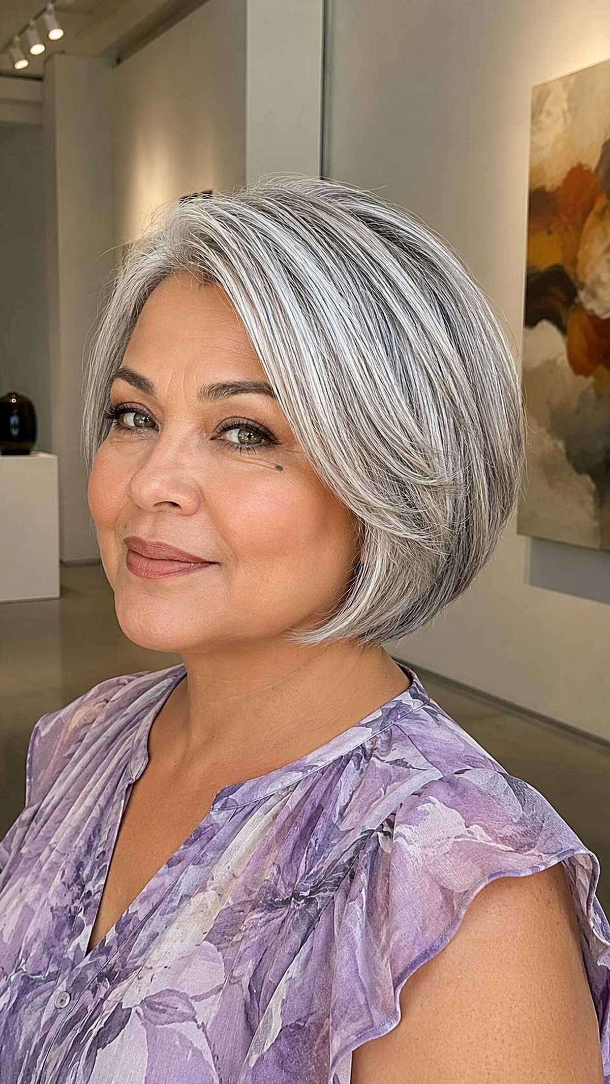 Polished silver and gray rounded bob with smooth finish