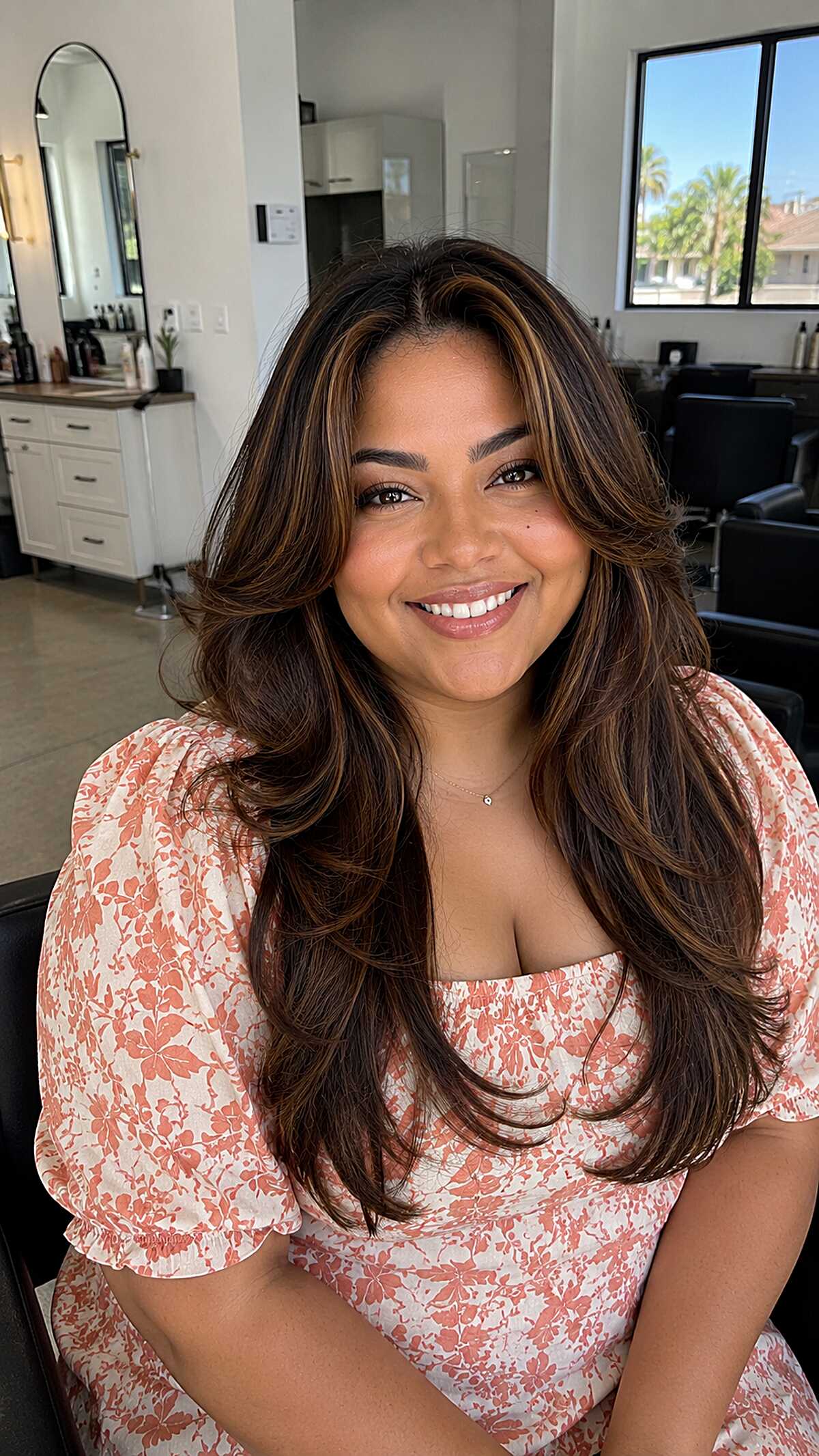 Long layered brunette with warm caramel balayage