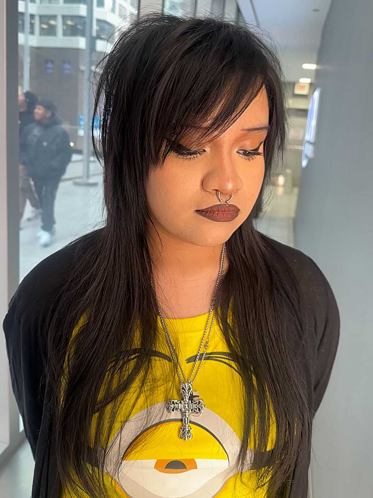 Long straight black hair with wispy piece-y side fringe