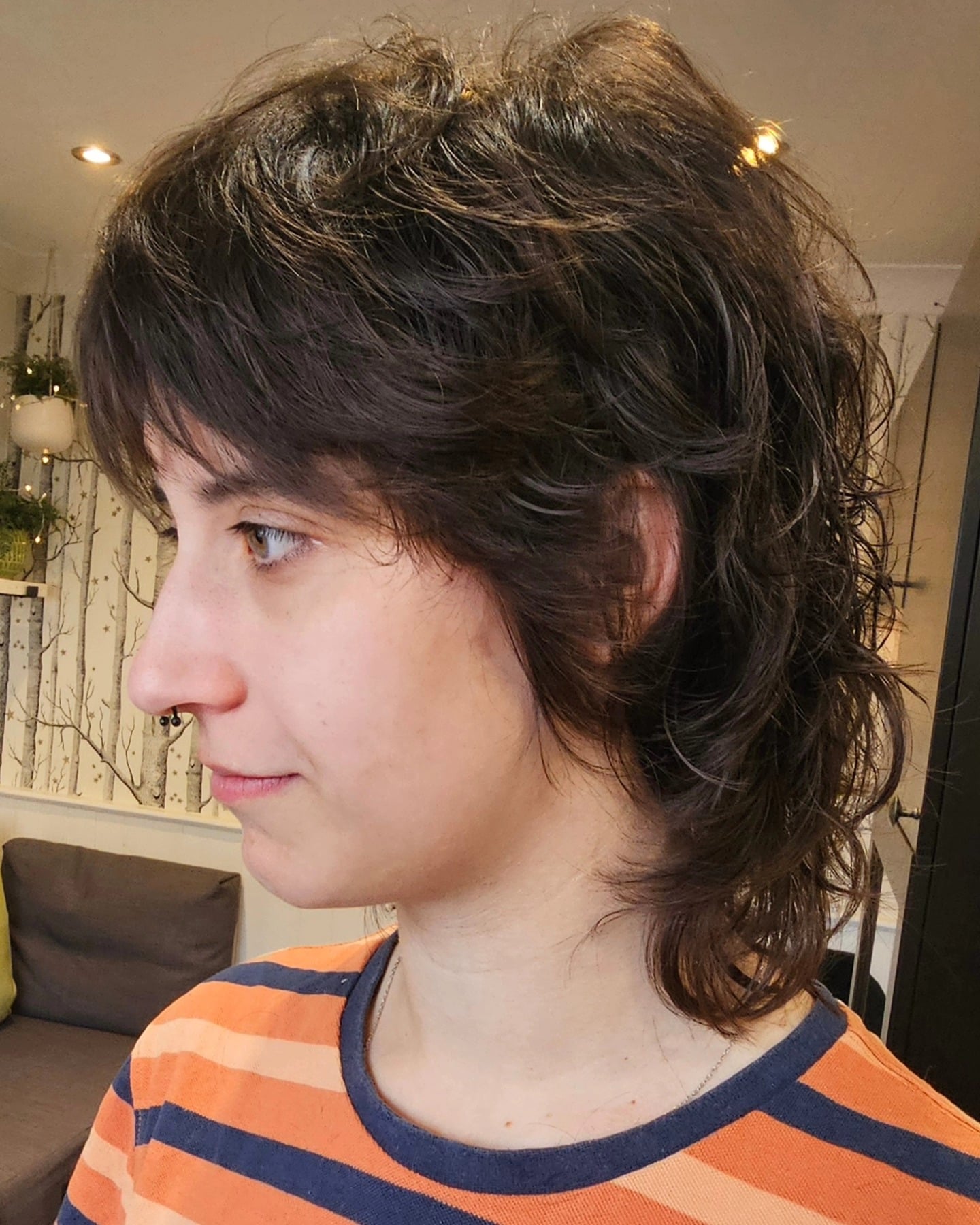 Short Dark Curly Wolf with Choppy Brow-Skimming Fringe