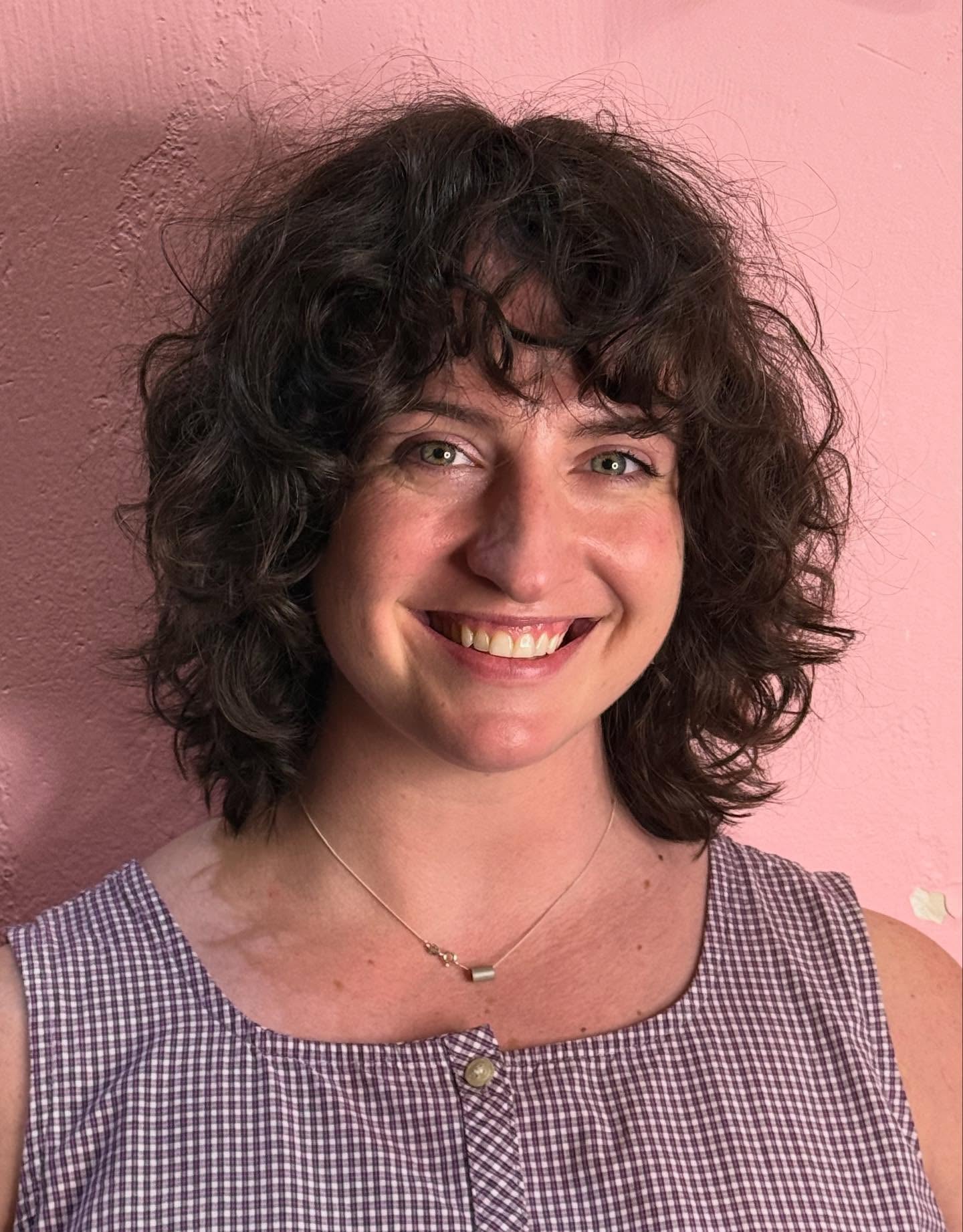 Shoulder-Length Dark Curly Wolf with Wispy Bangs