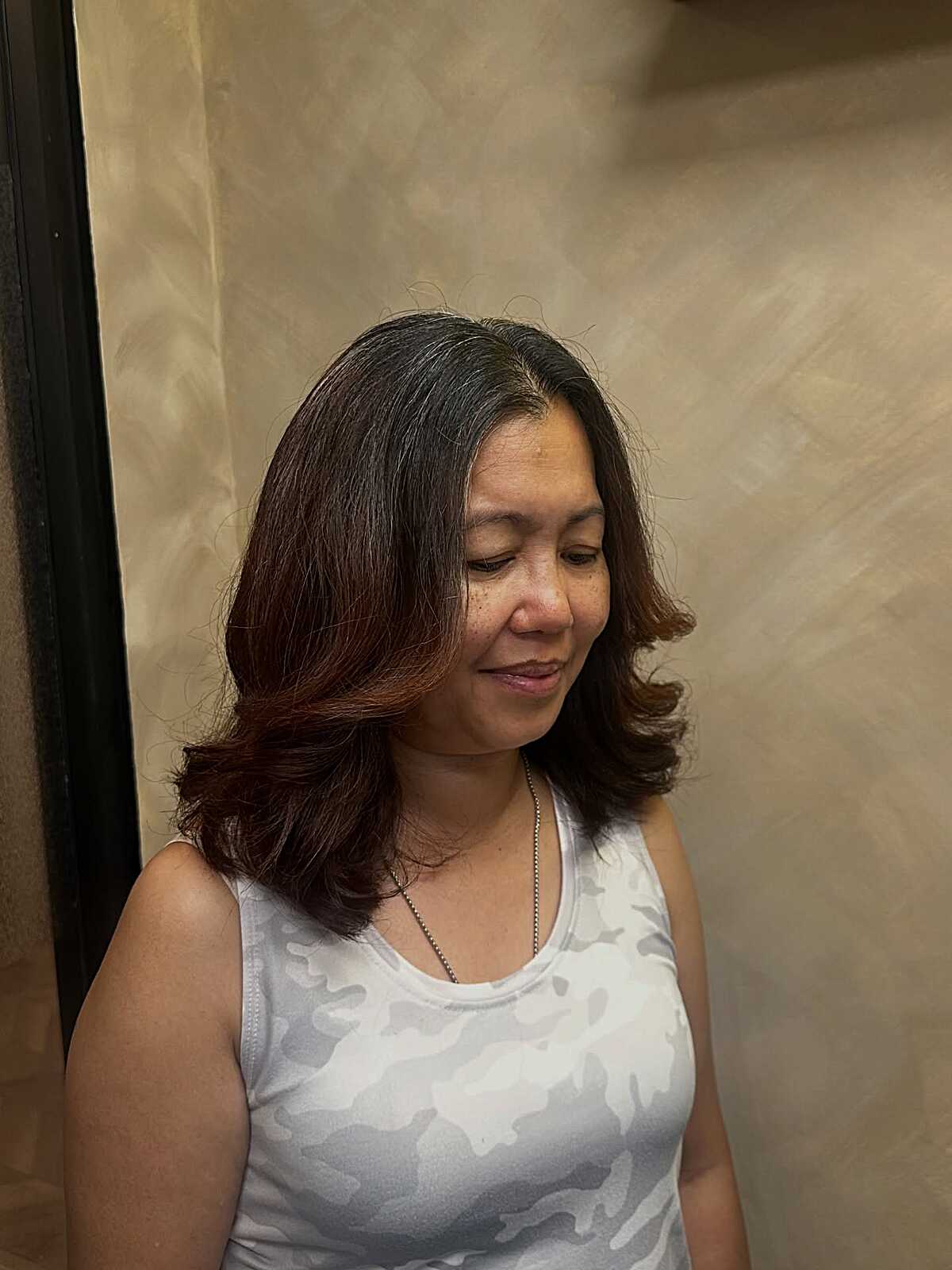 Dark brunette blowout with curled under ends