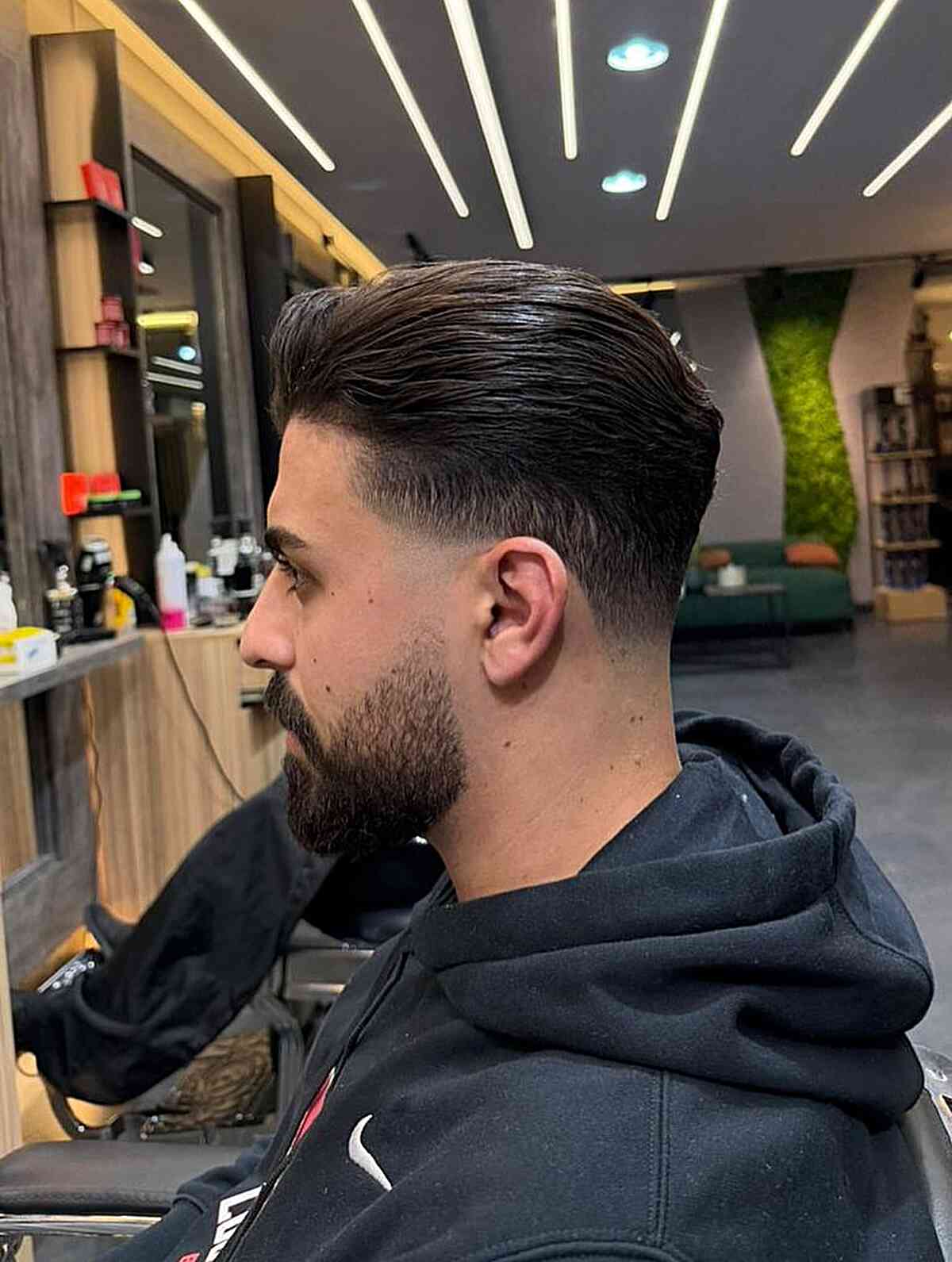 Sleek Tapered Pompadour with Defined Fade