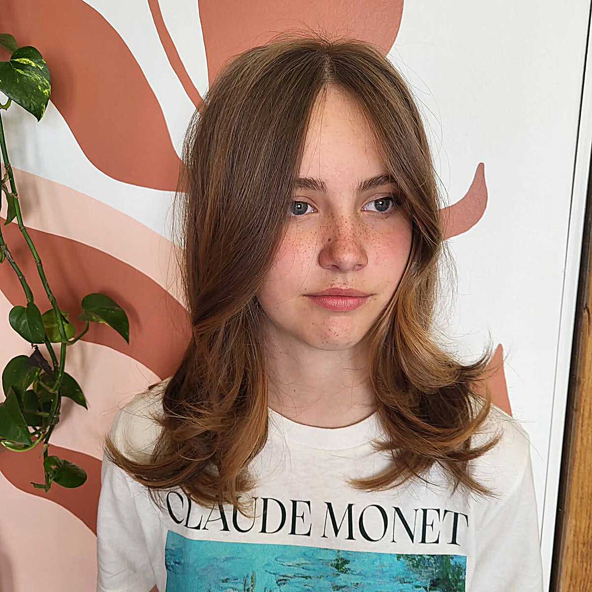 Light brown layered blowout with curtain fringe