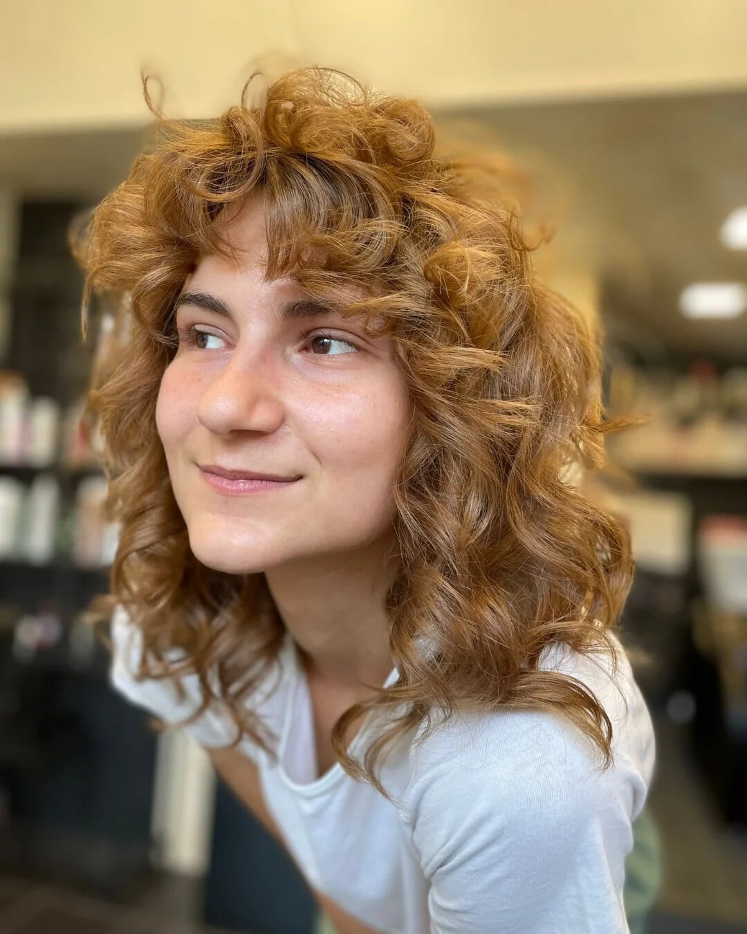 Strawberry Blonde Curly Wolf with Lived-In Shag Fringe