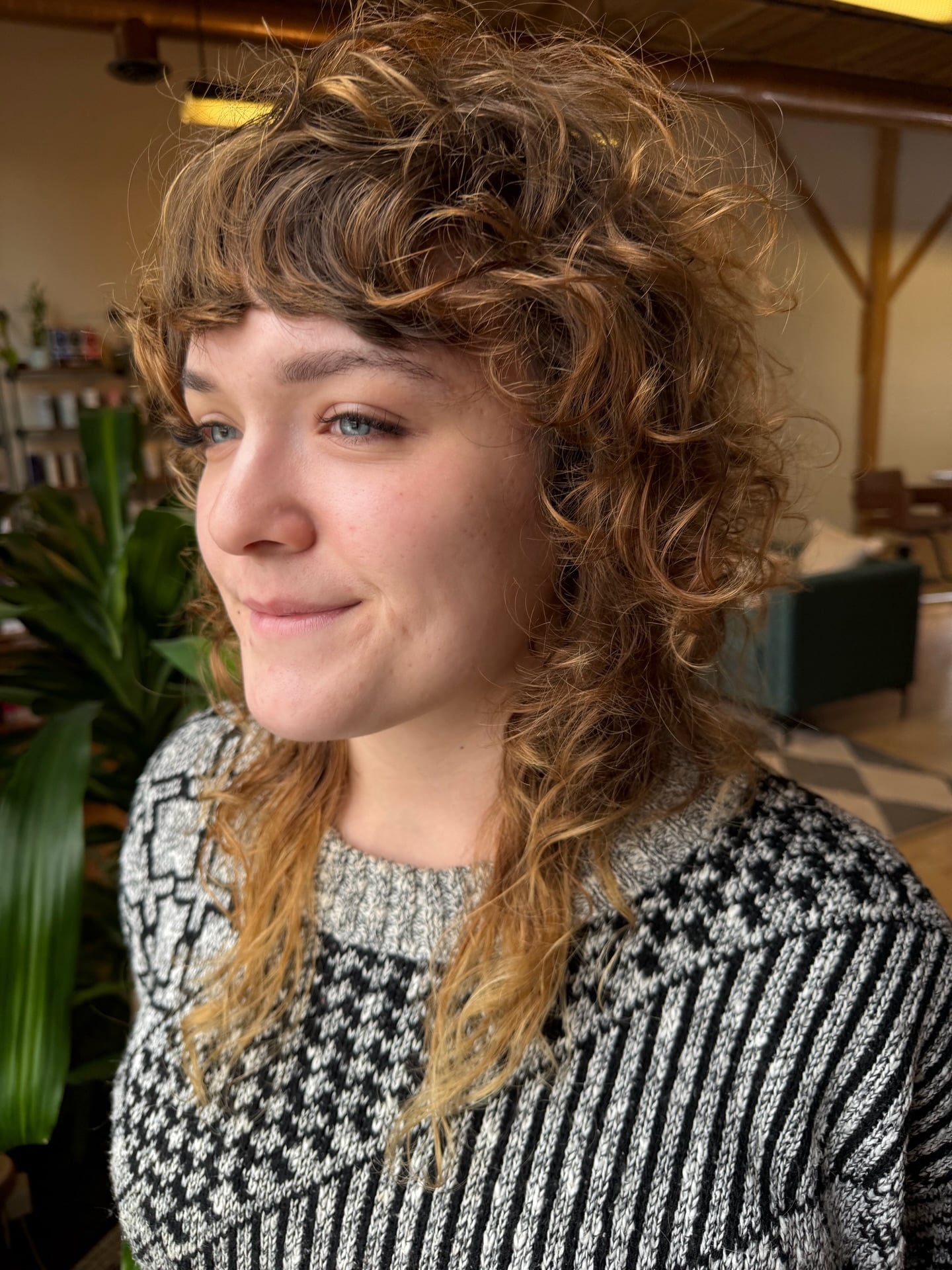 Warm Copper Curly Wolf with Curtain Bangs