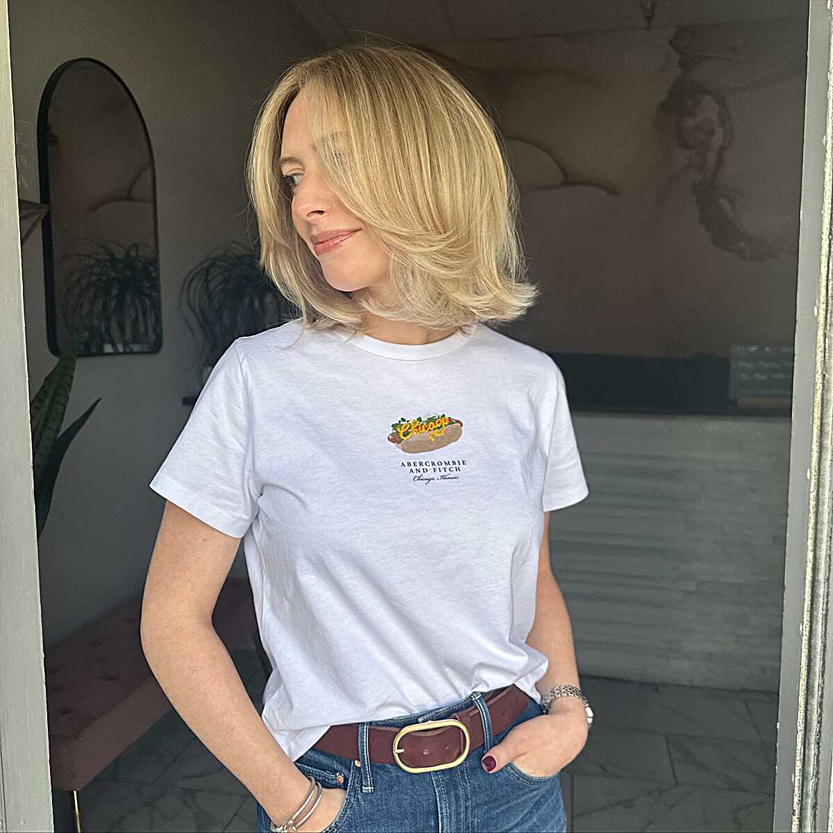 Golden blonde shoulder-length bob with flipped layers