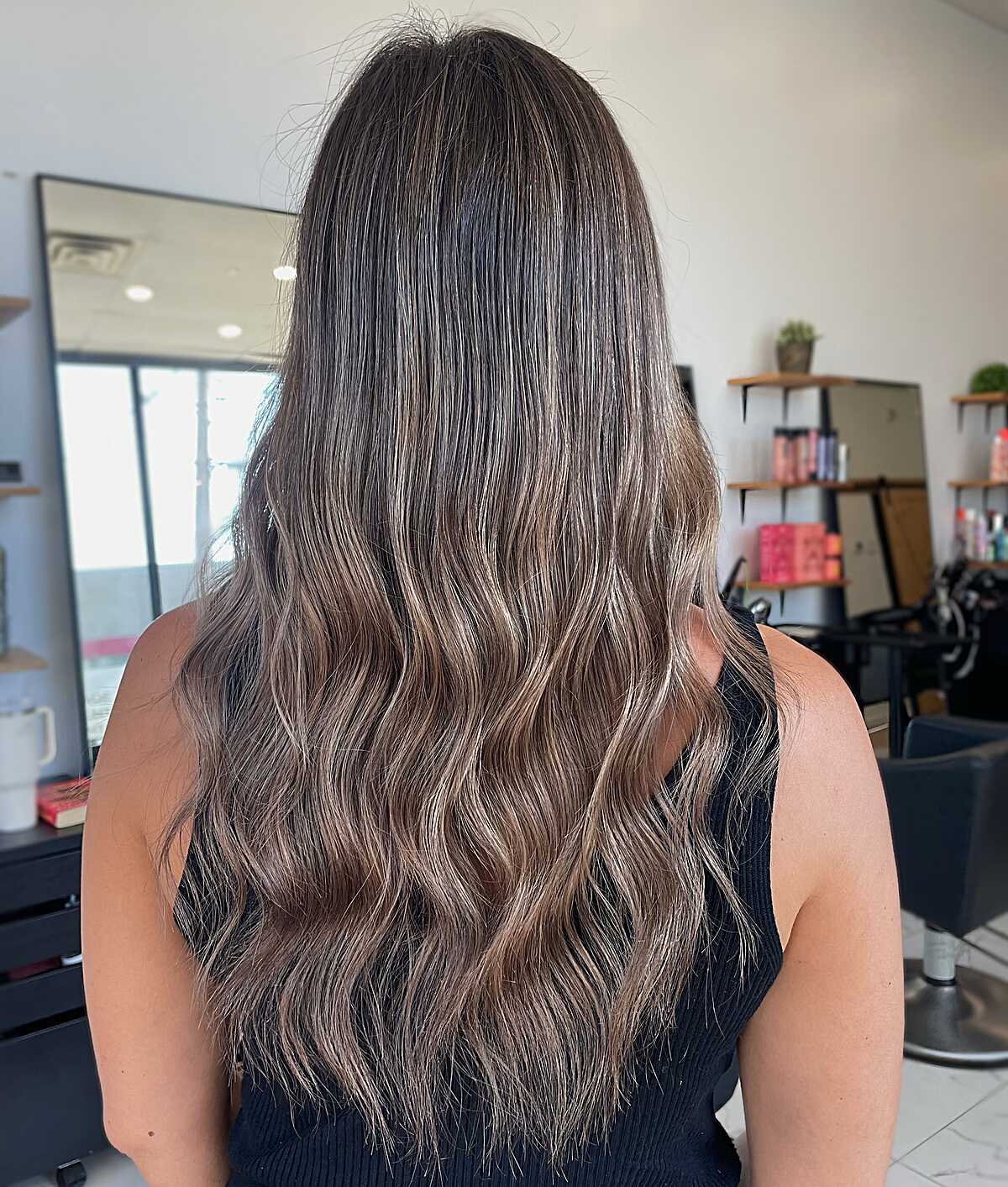 Long wavy brunette with cool mushroom latte tones