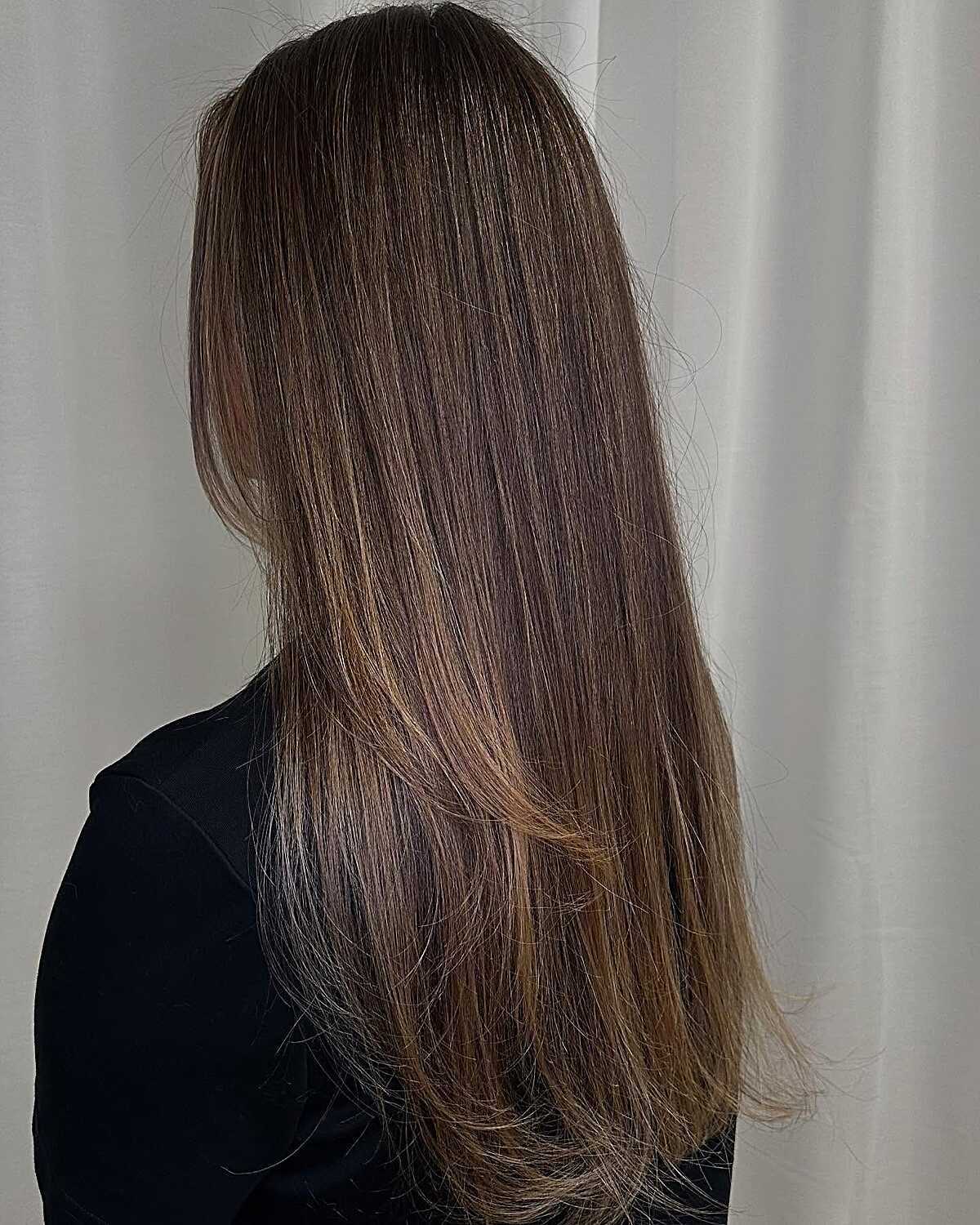 Long straight brunette with very subtle balayage