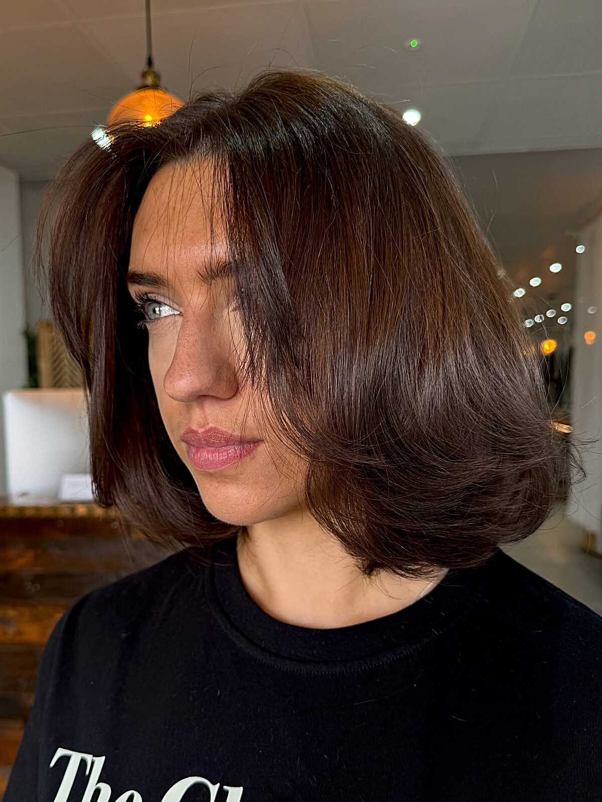 Rich mahogany brown bob with rounded shape and volume