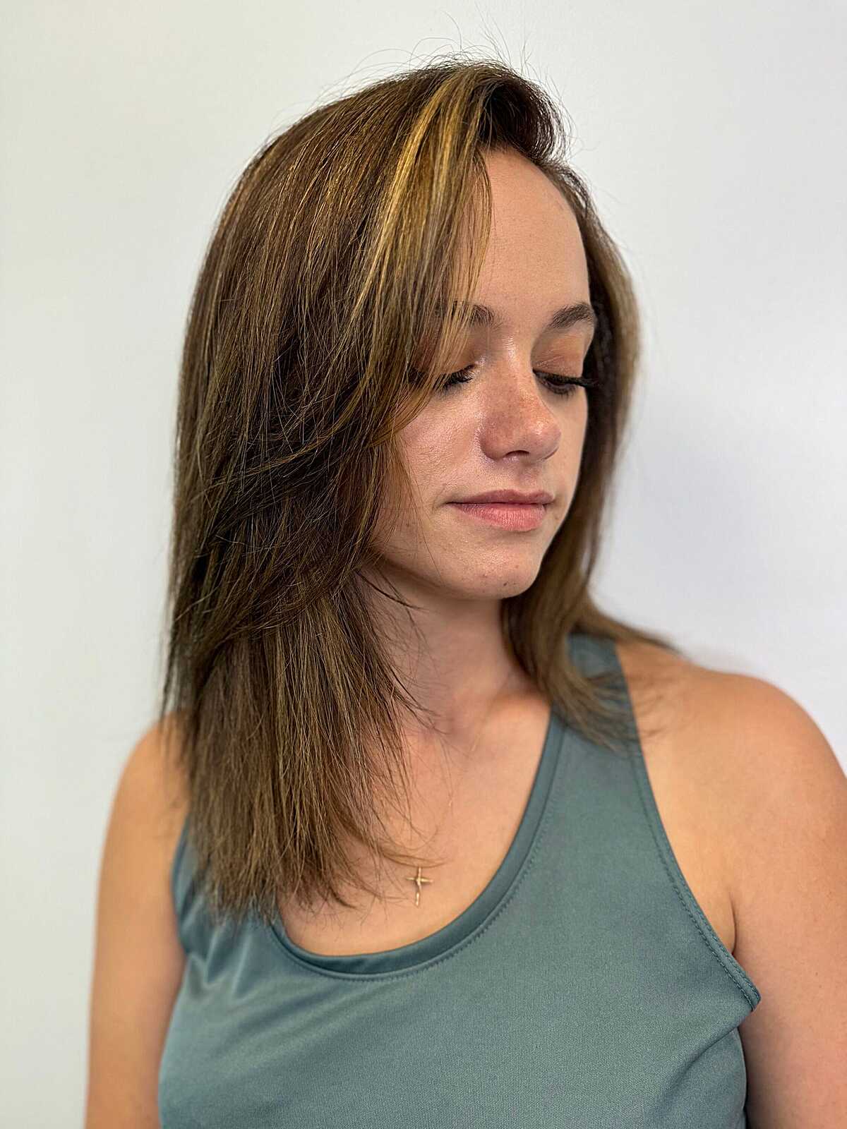 Medium-length shag with side-swept pieces and highlights