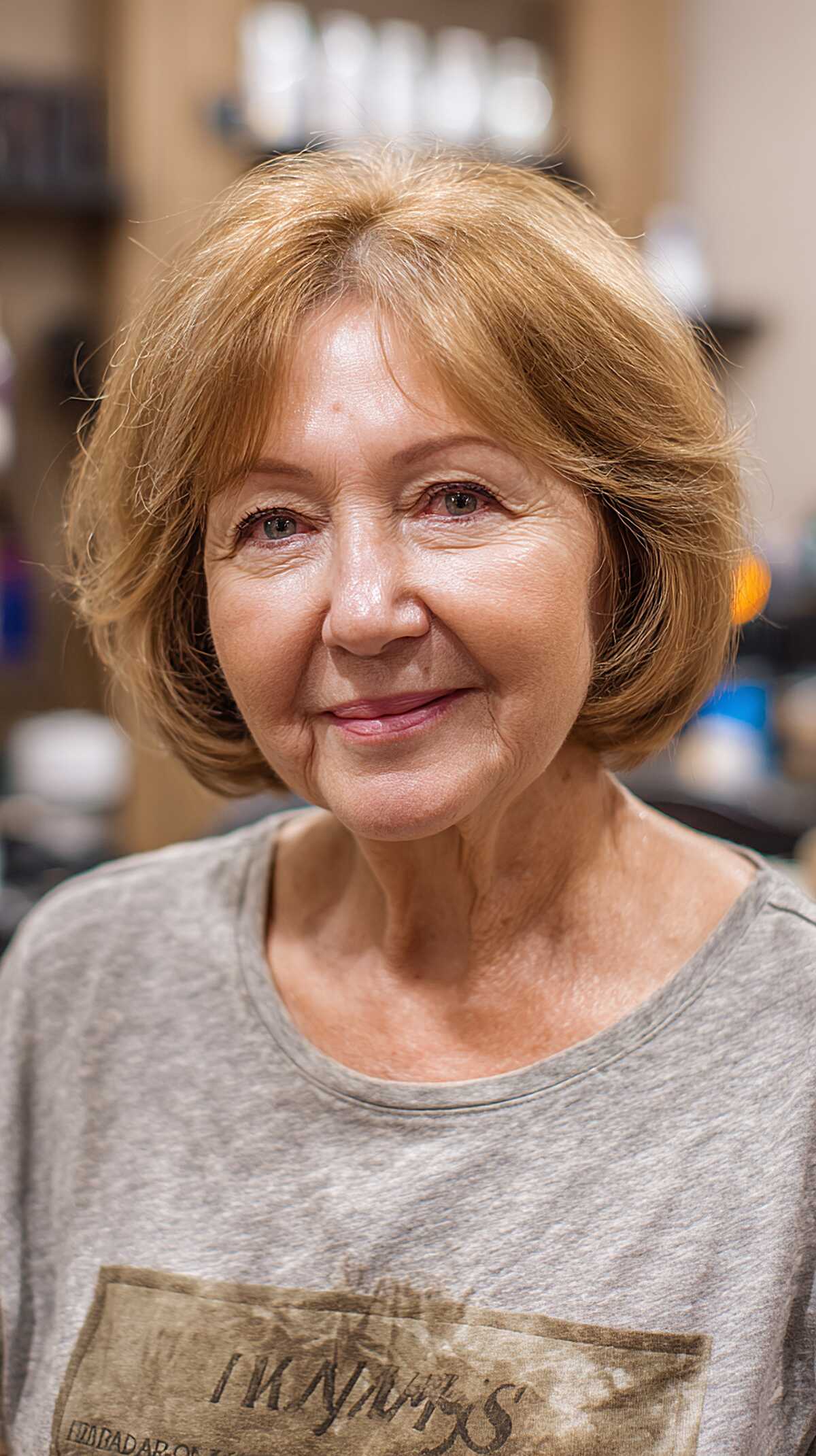 Chin-length warm auburn bob with flipped ends