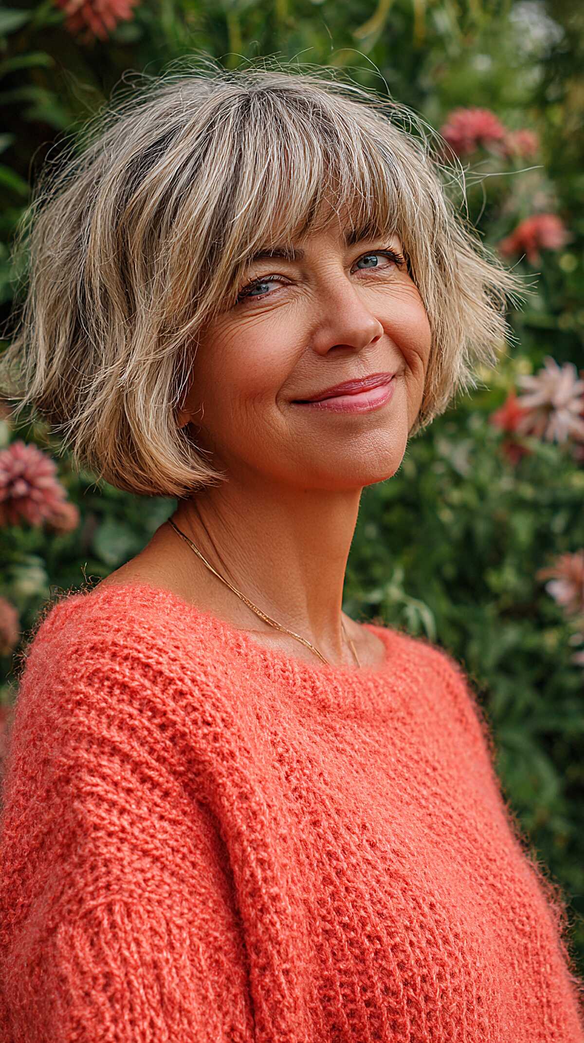 Ash Blonde Jaw-Length Shag with Full Textured Bangs
