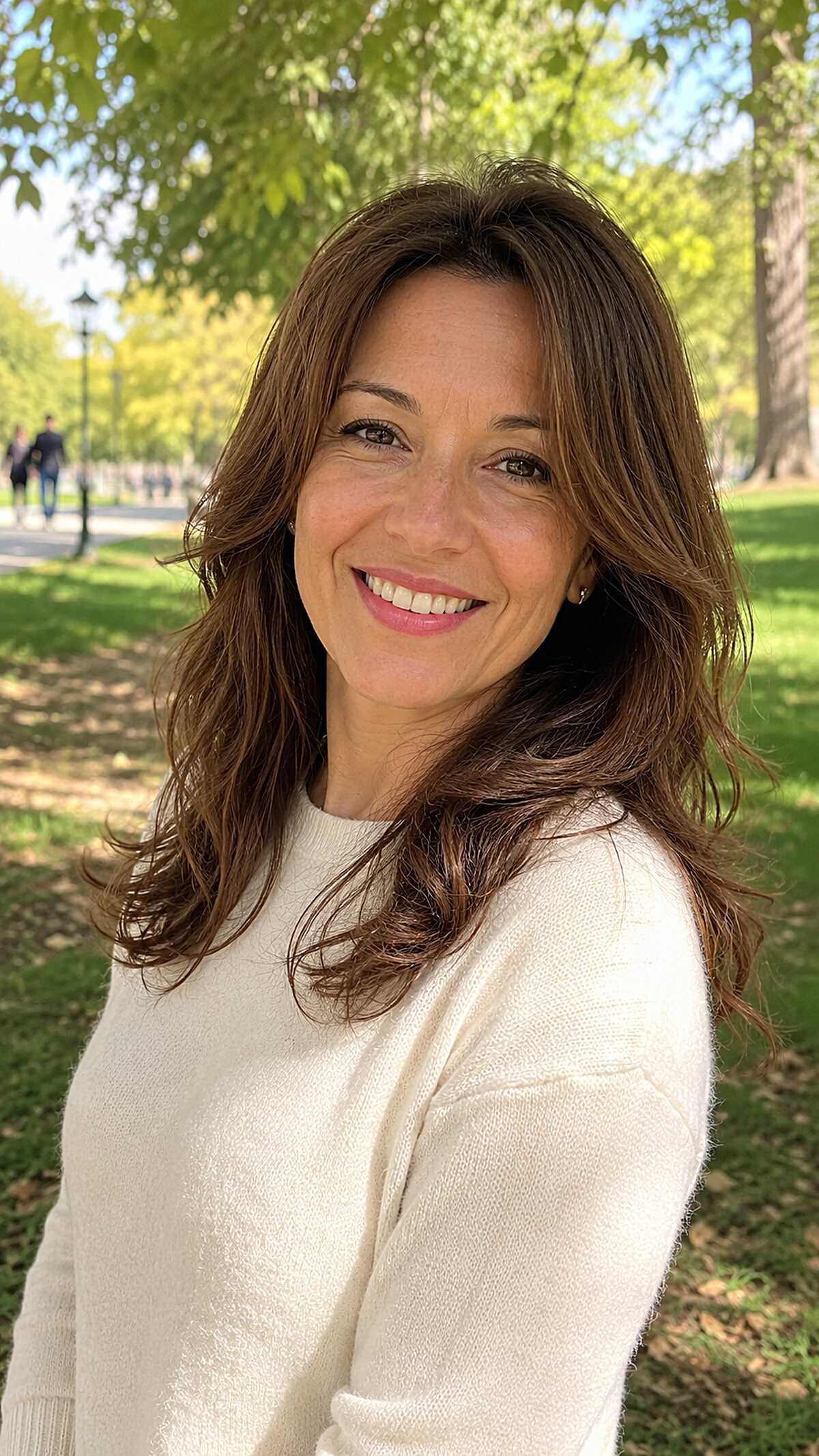 Rich dark brunette medium layered hair with bouncy ends