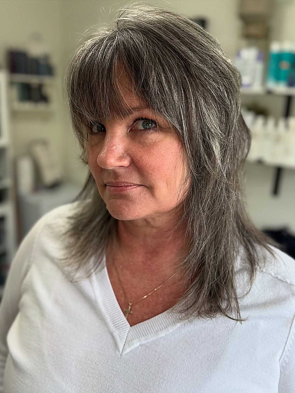 Gray and dark brown shag with full bangs
