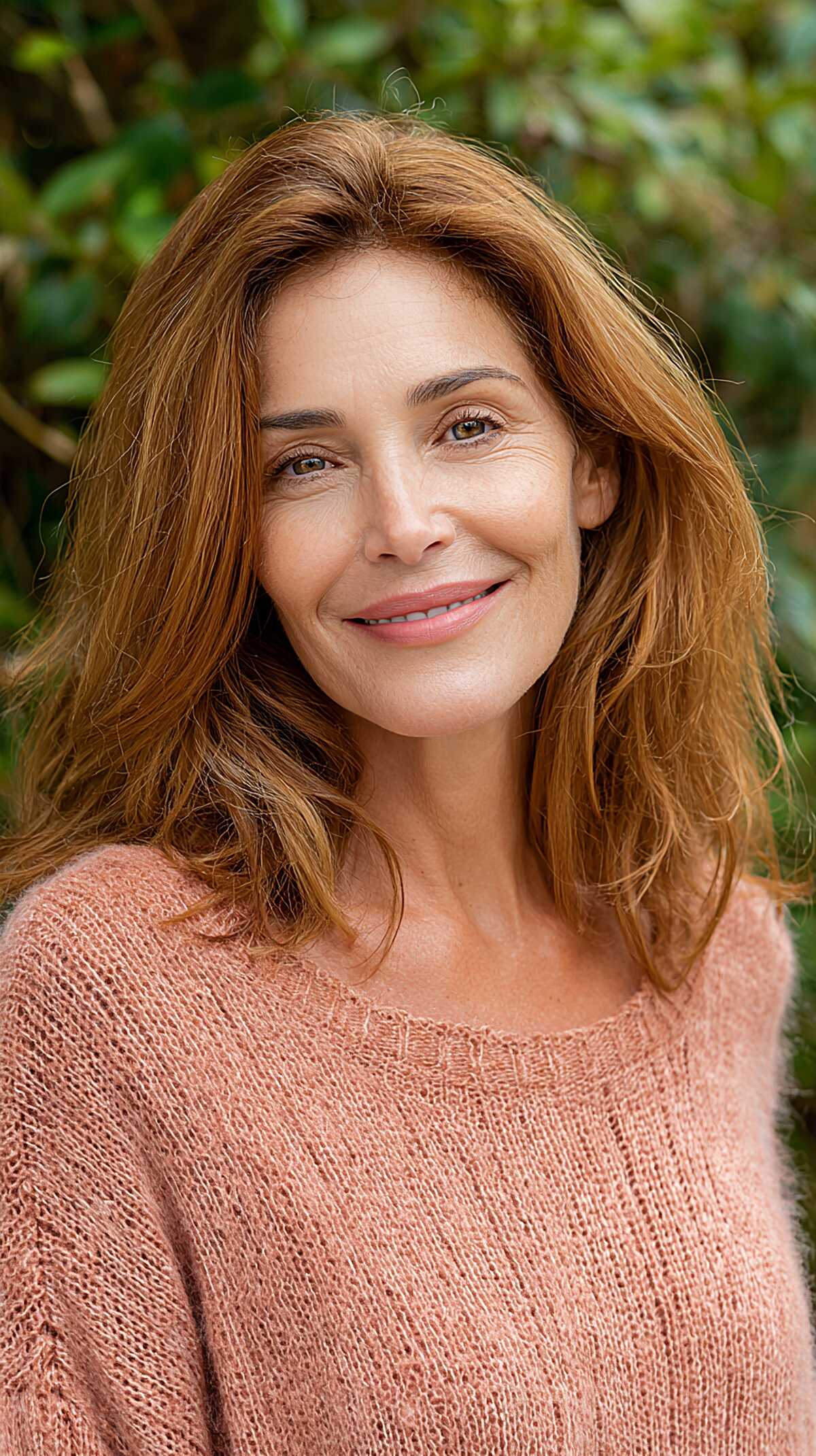 Soft auburn medium layered hair with natural texture