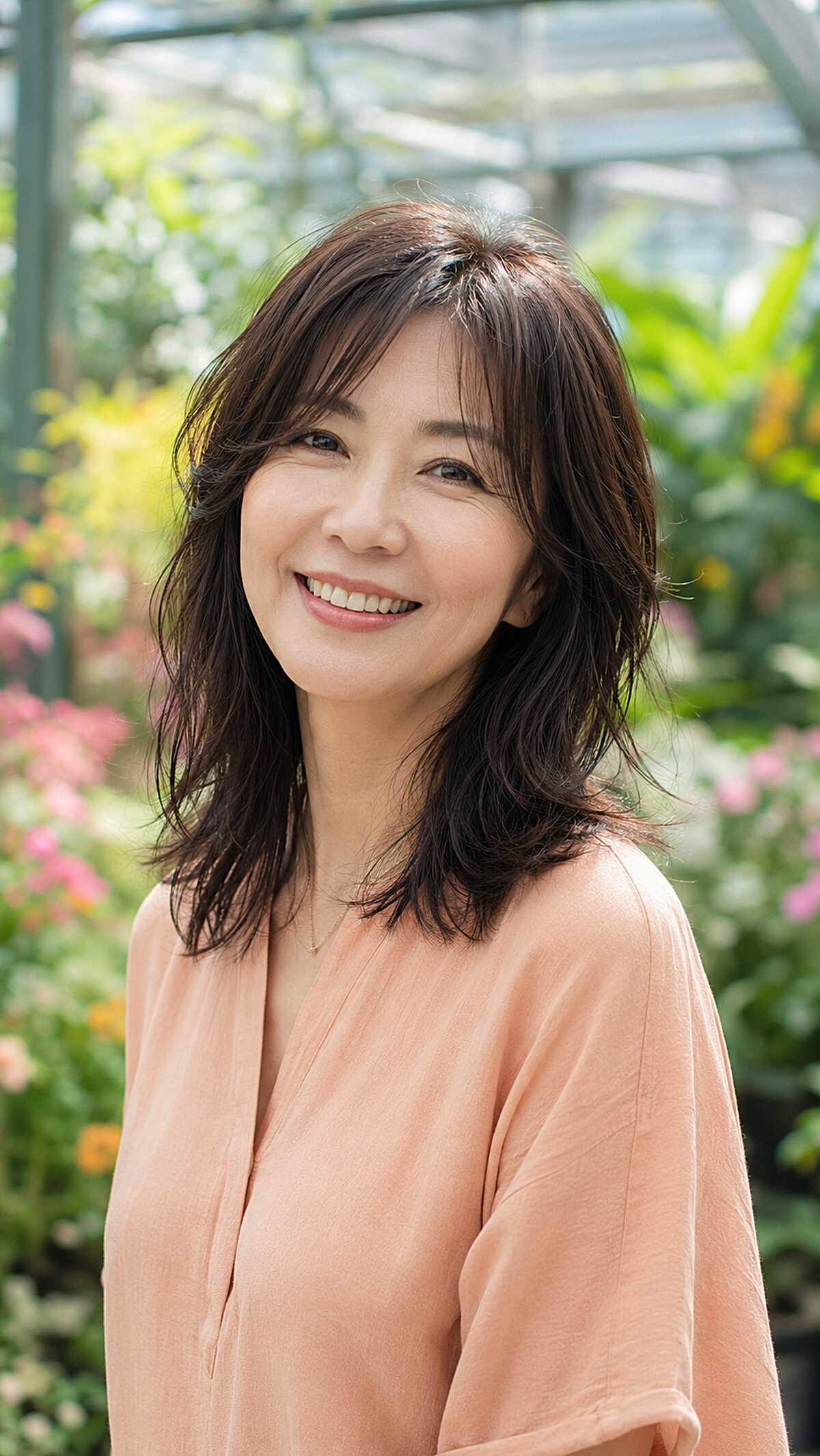 Soft Dark Shag with Feathered Midlength Layers and Piecey Curtain Bangs
