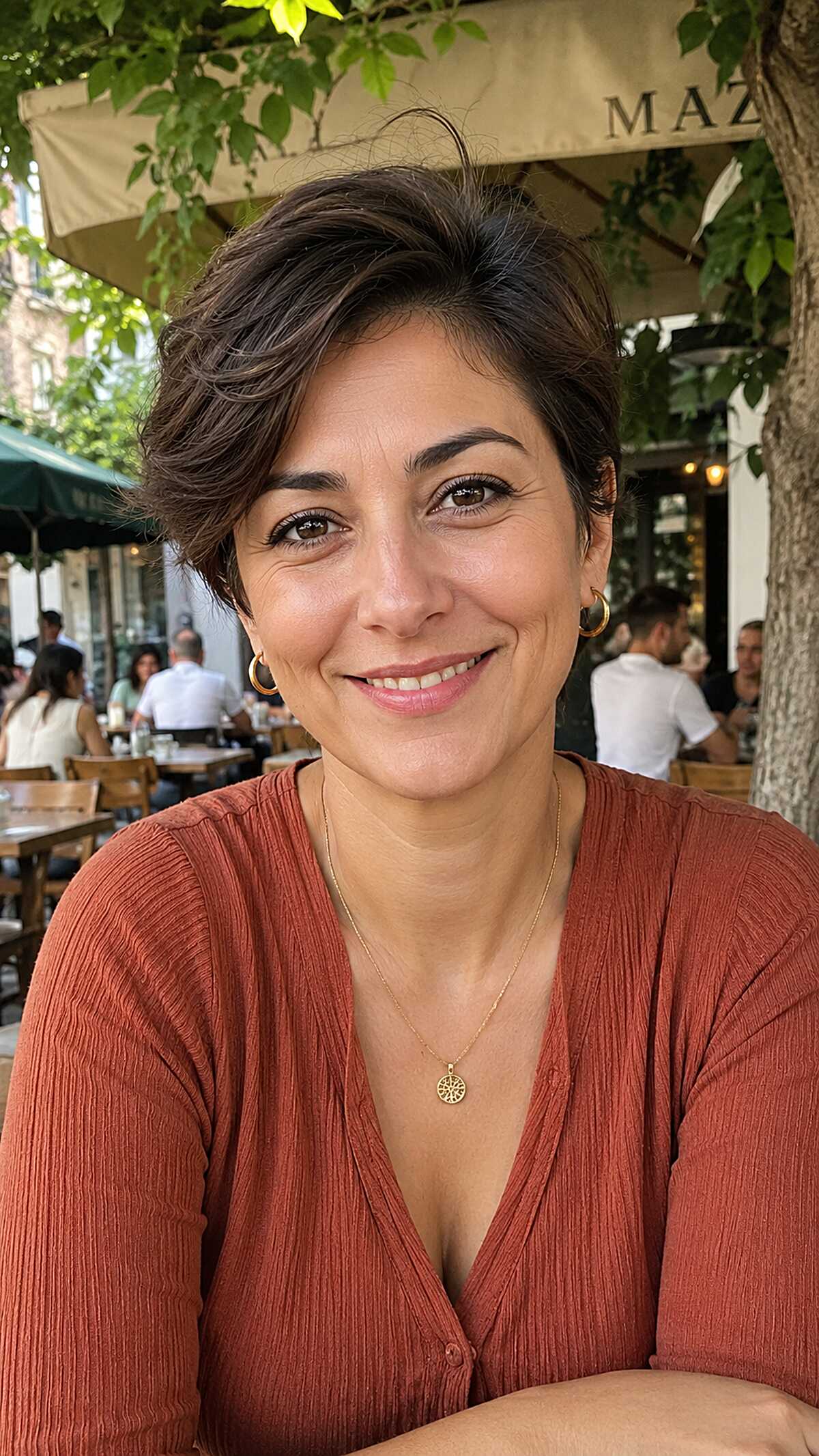Swept-Back Brunette Pixie with Soft Volume at the Crown