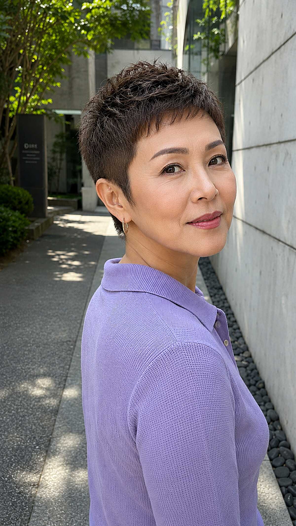 Curly textured top pixie with tapered sides in lavender