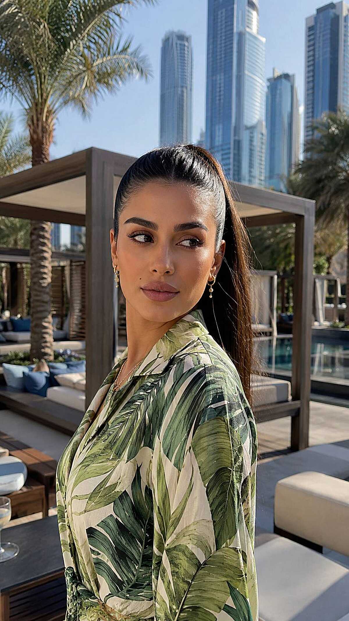Sleek dark hair pulled into tight high ponytail