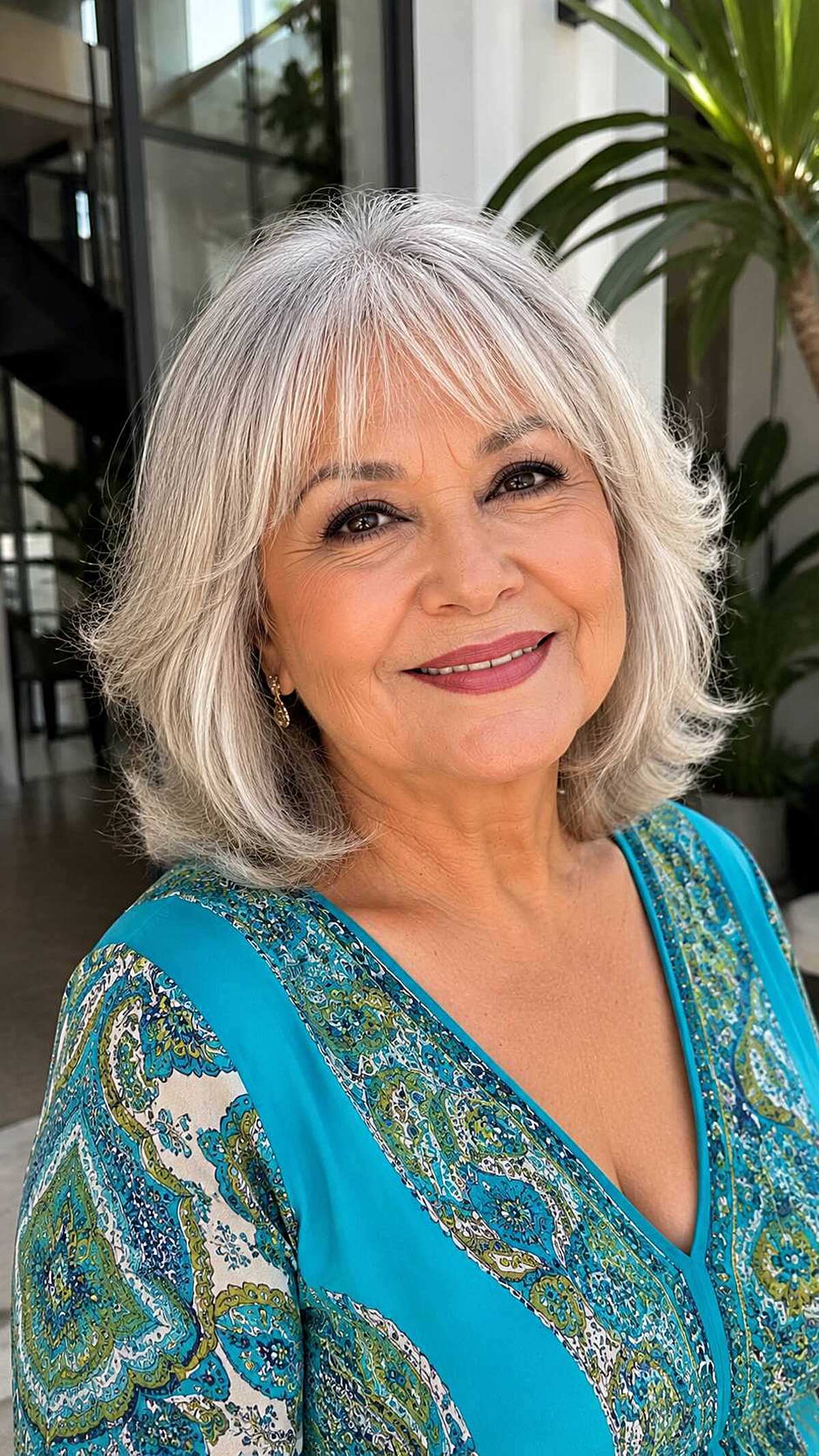 Silver gray bob with flipped ends and soft bangs
