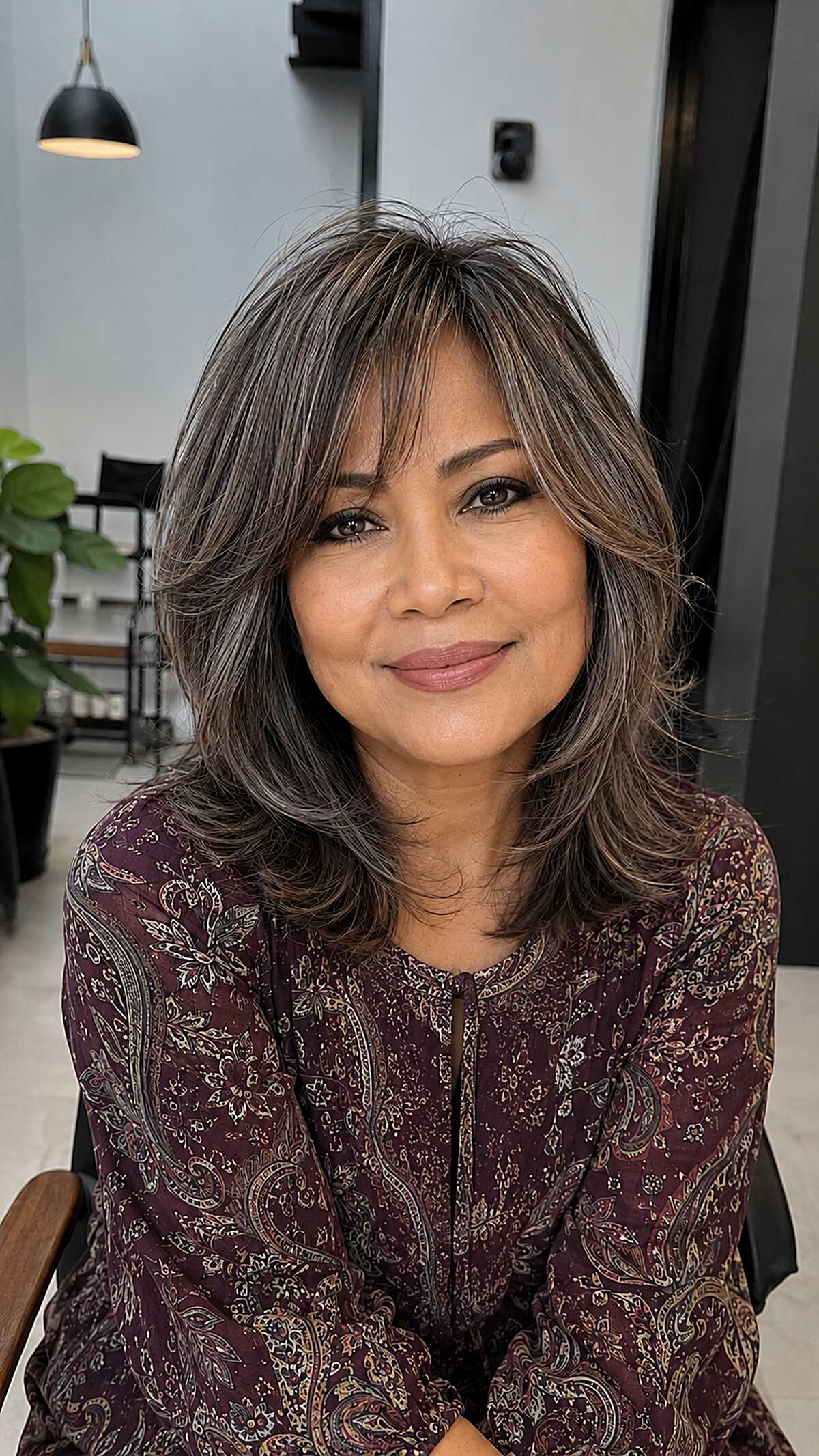 Silver-Threaded Brunette Shag Lob with Swooping Layers
