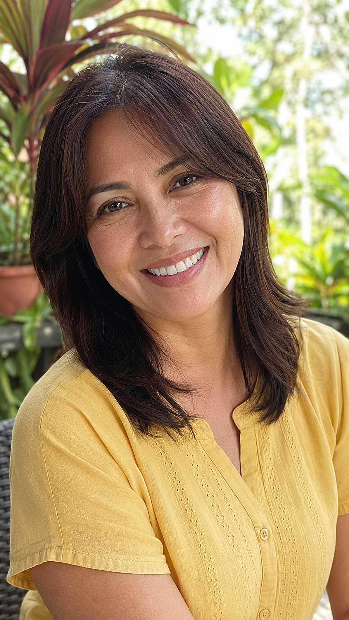 Soft Side-Swept Fringe on a Medium Layered Cut