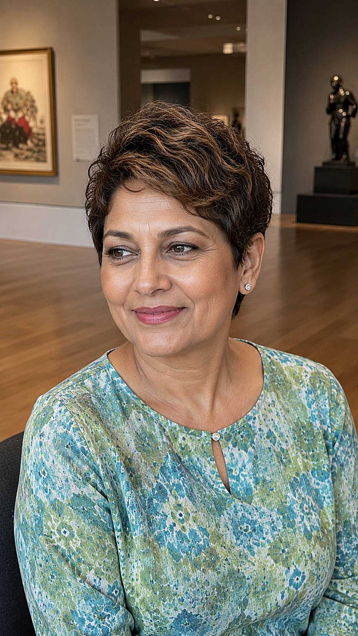 Short textured brunette pixie with caramel-tipped ends