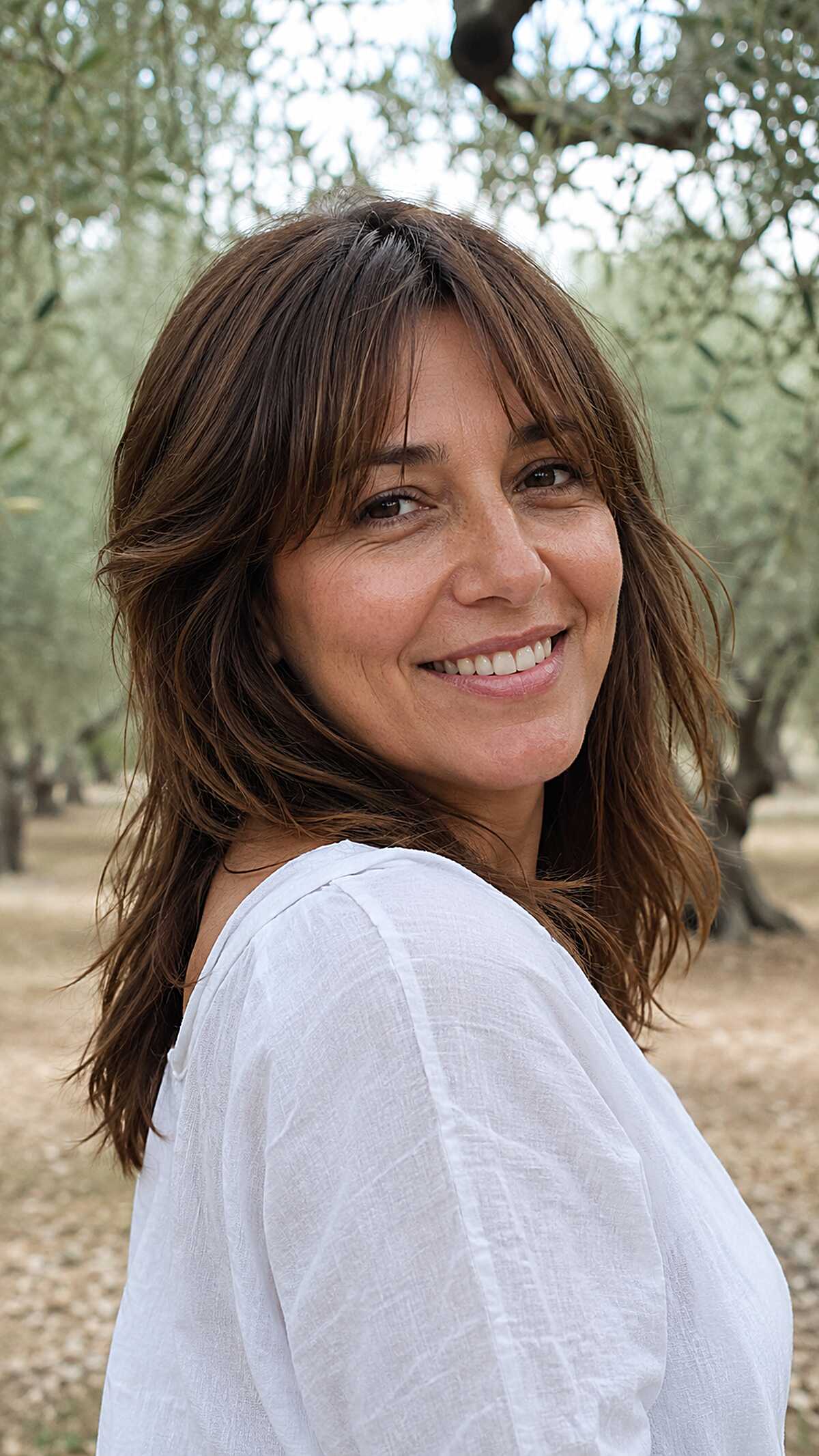 Warm Brunette Shag with Soft Separated Fringe and Natural Movement