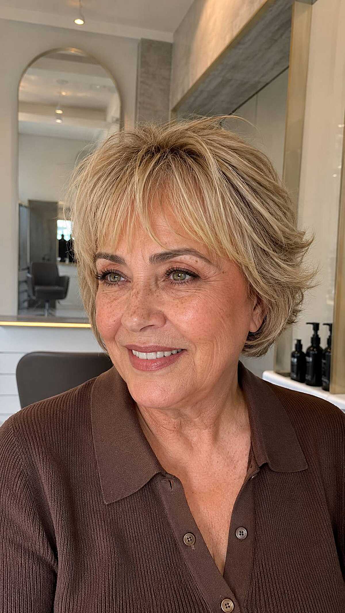 Honey blonde bixie with soft face-framing layers