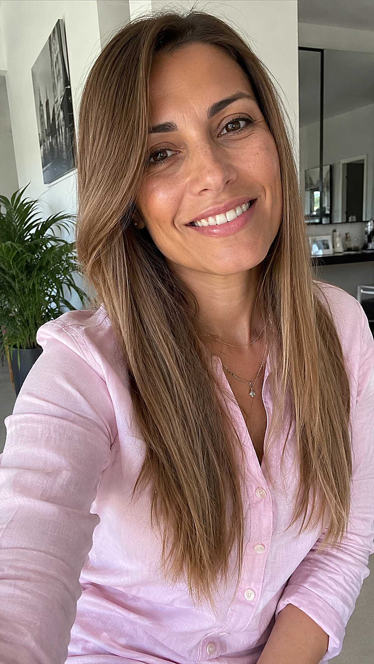 Long bronde hair with face-framing layers and movement