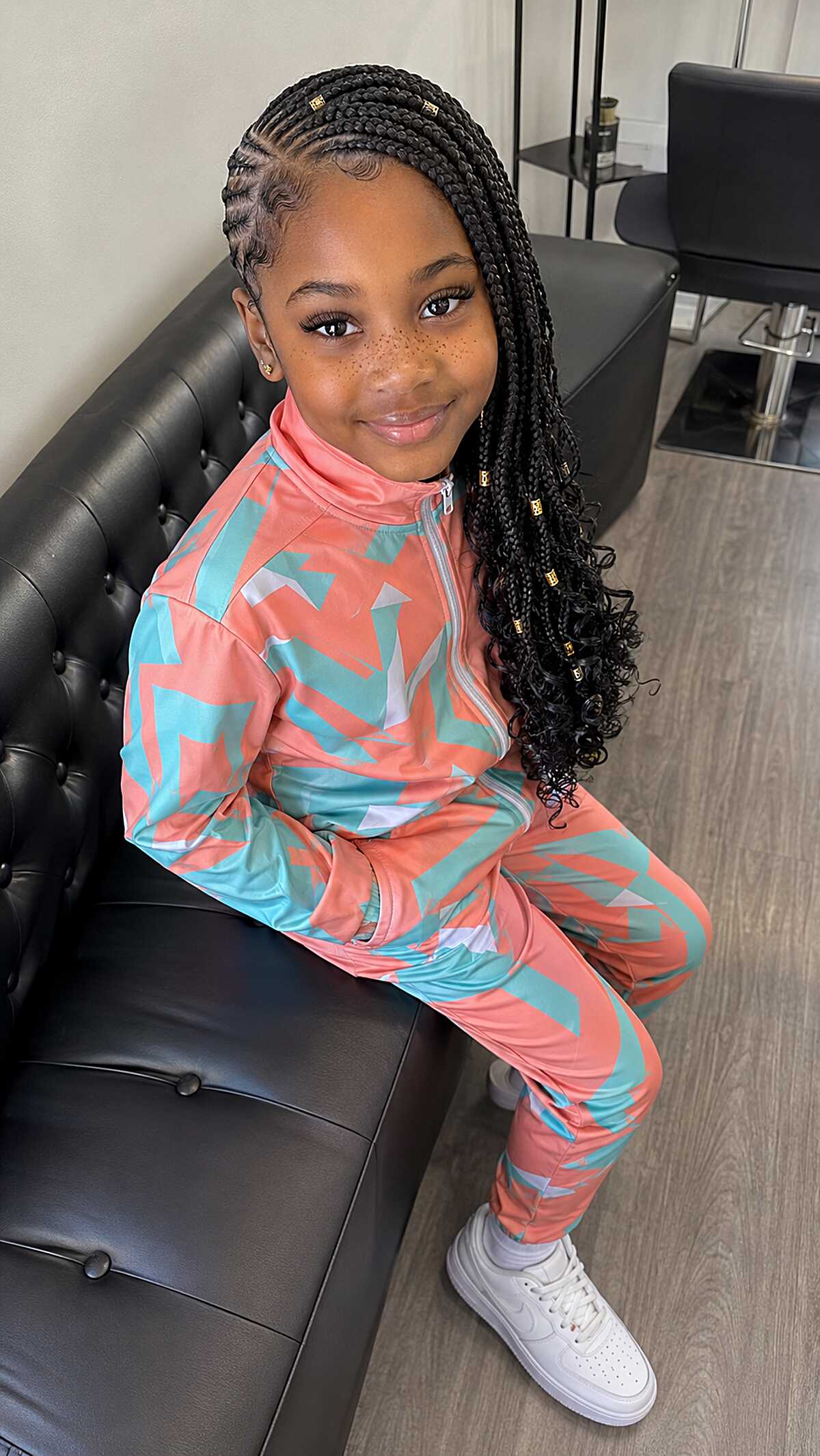 Side-Swept Cornrows into Curly-Ended Box Braids