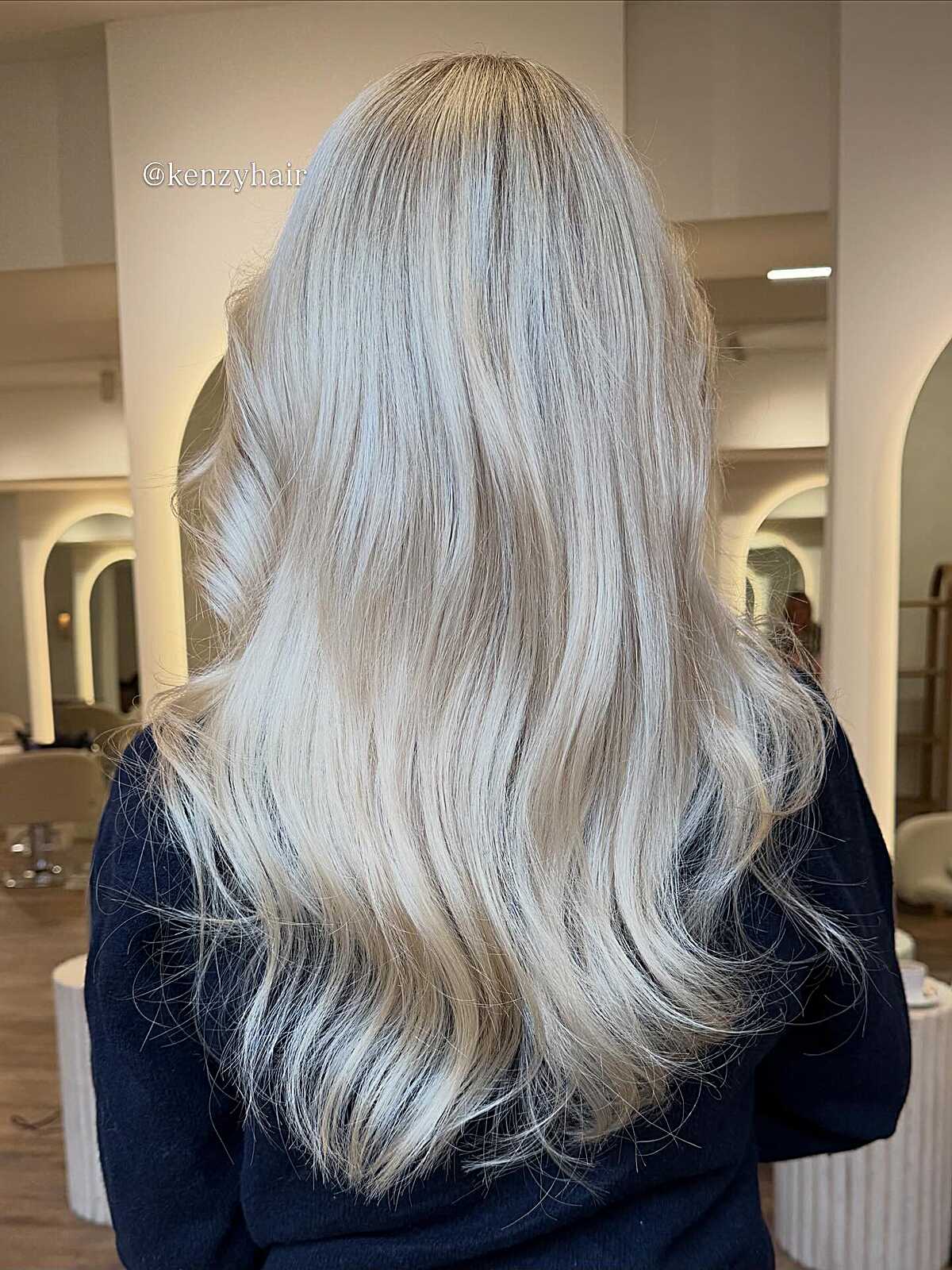 Long voluminous arctic pearl blonde with soft movement